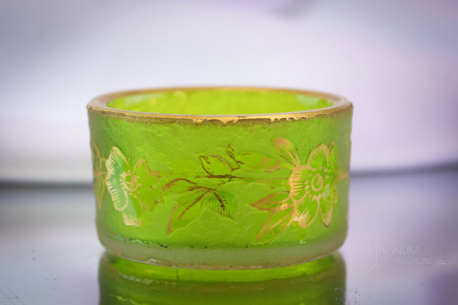 Signed Daum Nancy French Cameo Art Glass Open Salt: A highly collectible open salt in signed Daum Nancy French Art Glass. This oval-shaped open salt is green with gold decoration. It is decorated with florals. SHIPPING NOTICE: If you choose not to util