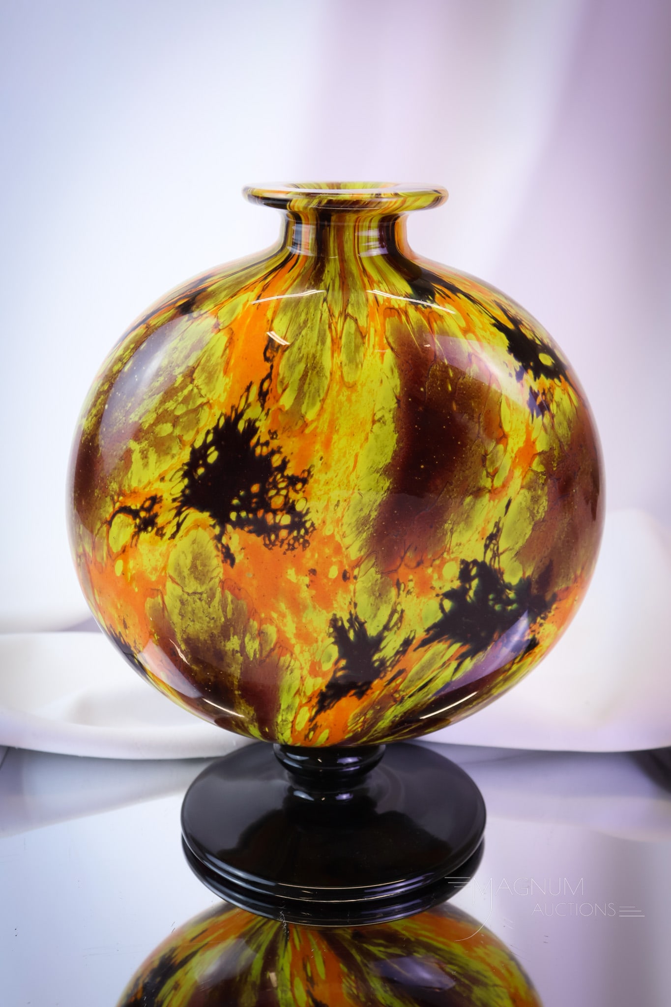 Signed Schneider Art Deco French Mottled Glass Vase: A colorful Art Deco signed Schneider French glass vase. This beautiful piece features a pedestal form and rich mottled colors of orange, yellow, and brown. The vase measures 10" tall. SHIPPING NOTICE: