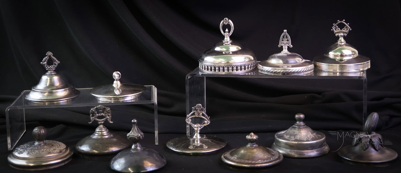 12 pc Lot Victorian Silverplate Pickle Castor Lids: A more than generous offering of a dozen Victorian silverplate pickle castor lids. Various shapes and sizes in this plentiful lot. The tallest measures 3". SHIPPING NOTICE: If you choose not to utiliz