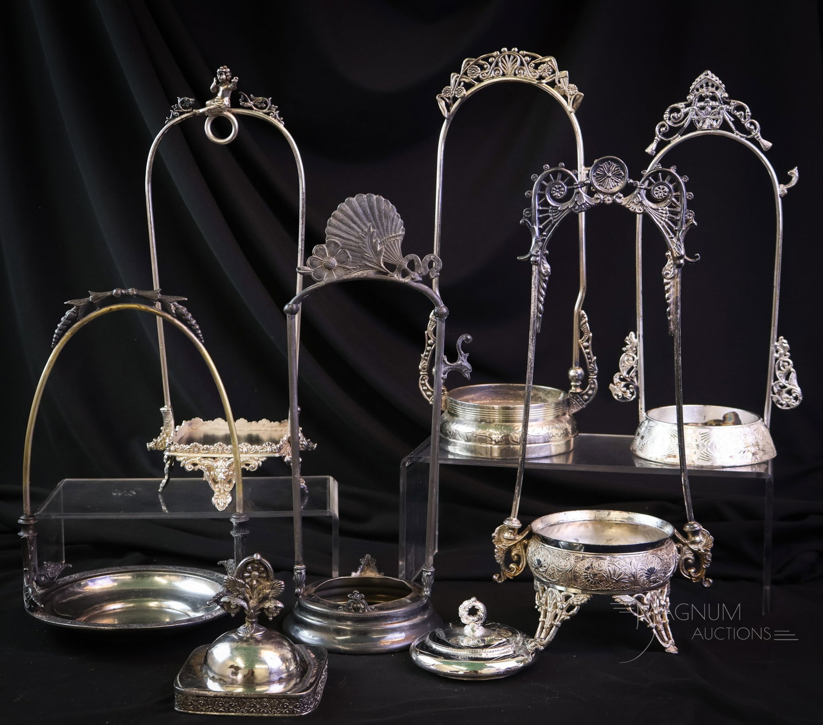 6 pc Lot Victorian Silverplate Pickle Castor Frames: A wonderful offering of a half dozen Victorian silverplate pickle castor frames. Some very nice examples all going for one money! Will you be the highest bidder? The tallest measures 11 1/2". SHIPPING