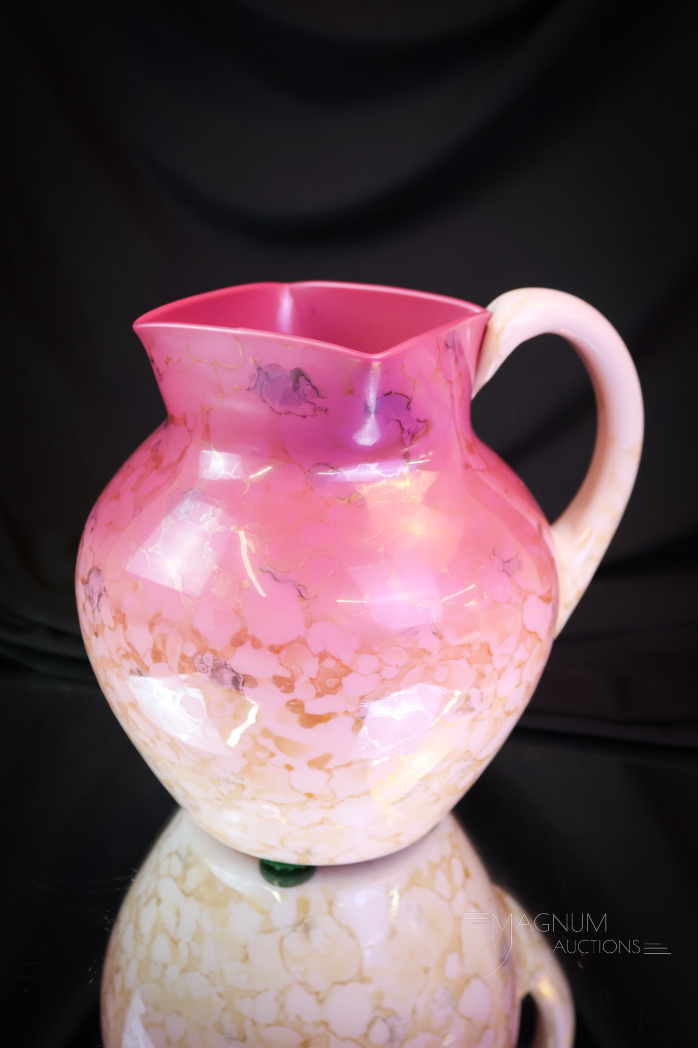 New England Victorian Peachblow Agata Glass Water Pitcher: A very pretty and seldom found Victorian water pitcher in New England glass. This pitcher is in peachblow with agata decoration. A very nice example if we do say so!. This pitcher measures 7 1/4" tall