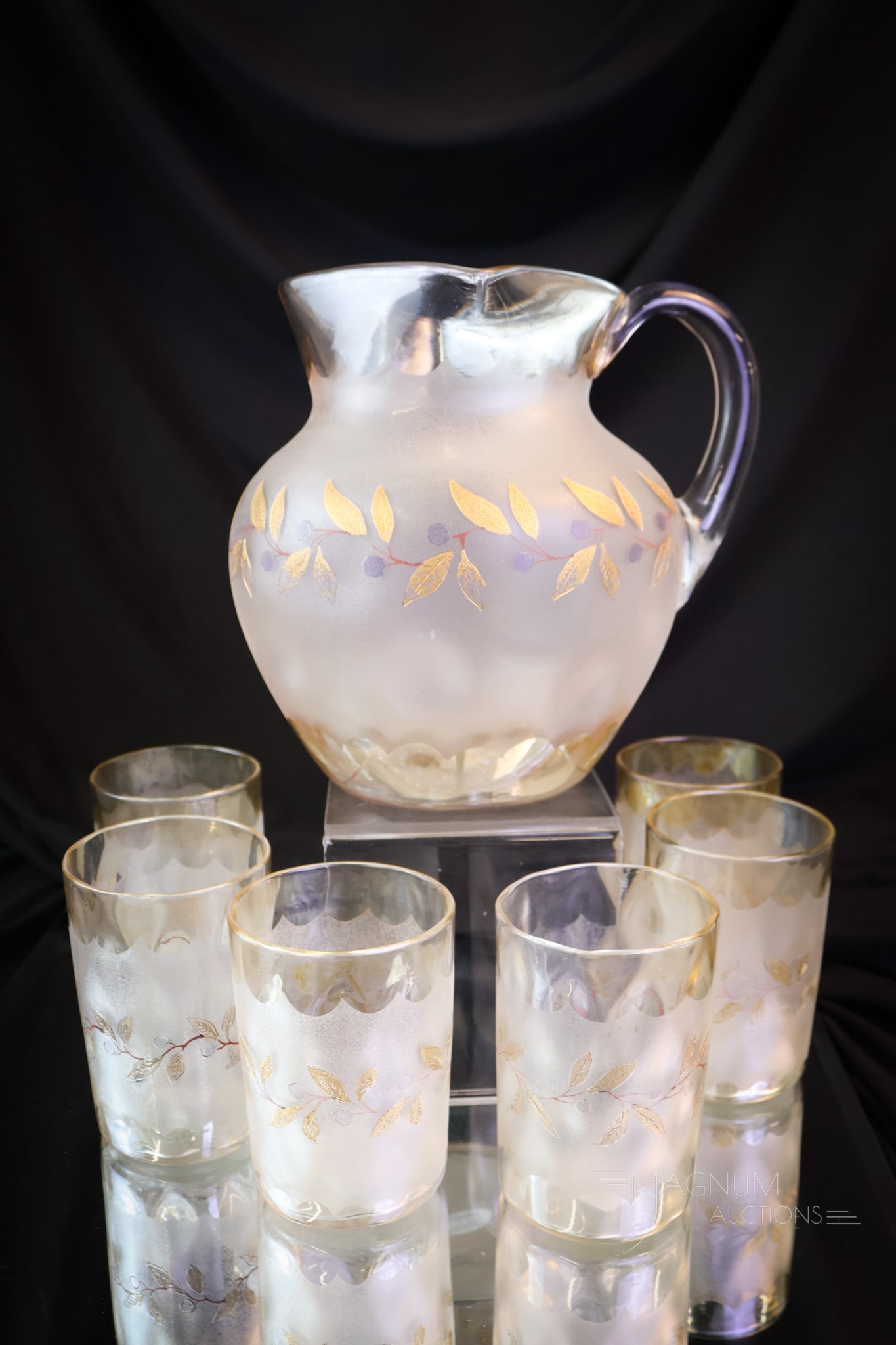 7 pc Victorian New England Blueberry & Leaf Pomona Glass Water Set: A very unusual find. This is a Pomona Victorian glass water set in the Blueberry & Leaf pattern. This set includes a pitcher and six tumblers. The tallest of the offerings measures 7 1/4". SHIPPING NO
