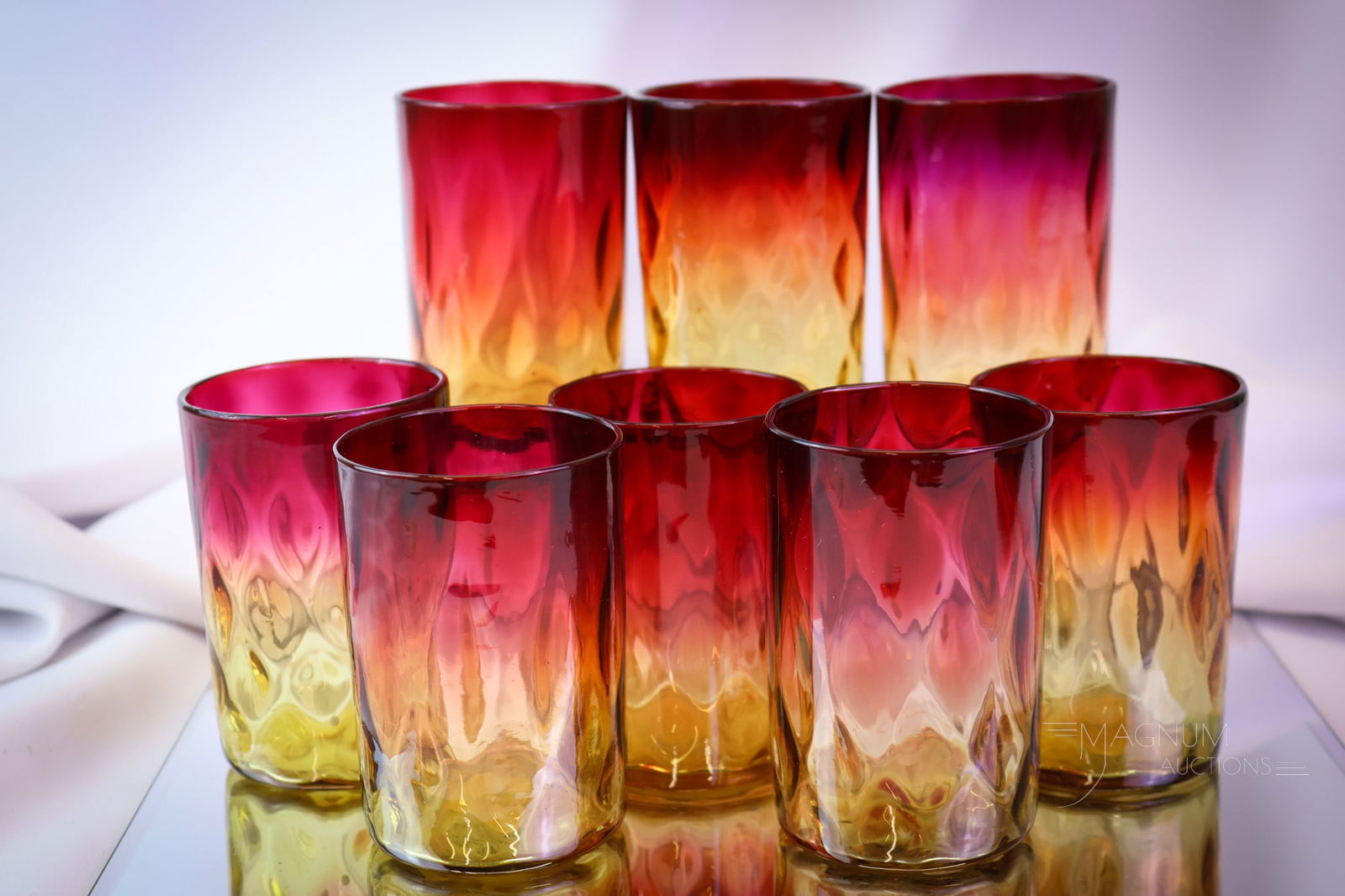 8 pc Lot Mt. Washington Victorian Amberina Diamond Quilt Tumblers: A select lot of eight Victorian Mt. Washington amberina tumblers. Each has amazing coloring. The tallest measures 3 7/8". SHIPPING NOTICE: If you choose not to utilize the LiveAuctioneers LiveShip pro