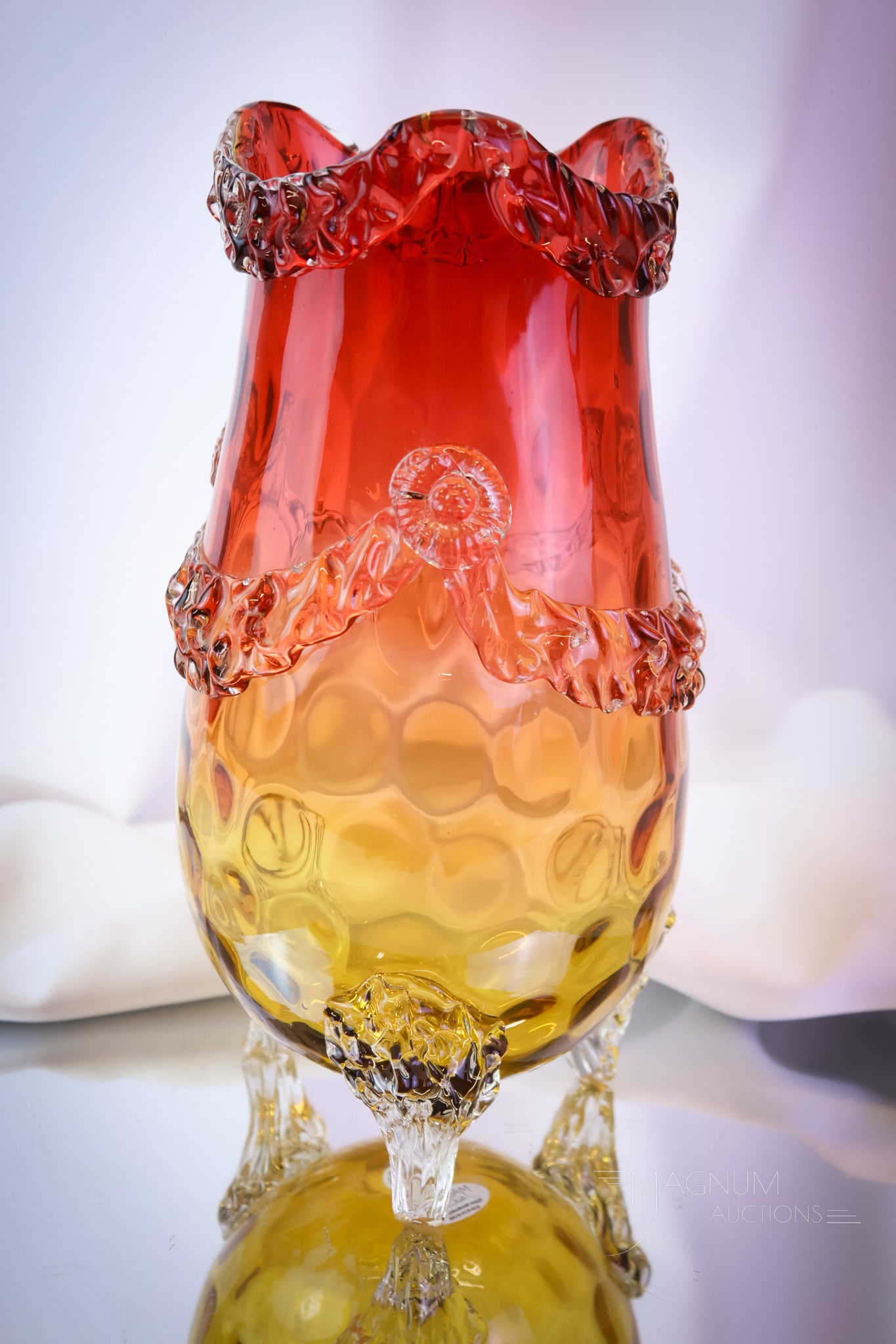 Monumental Victorian Amberina Applied Glass 10 1/2" Vase: A monumental find in Victorian amberina glass. This vase measures 10 1/2" tall of pure loveliness. This vase has three applied feet and an applied floral prunts and swags along with an applied rim. Be