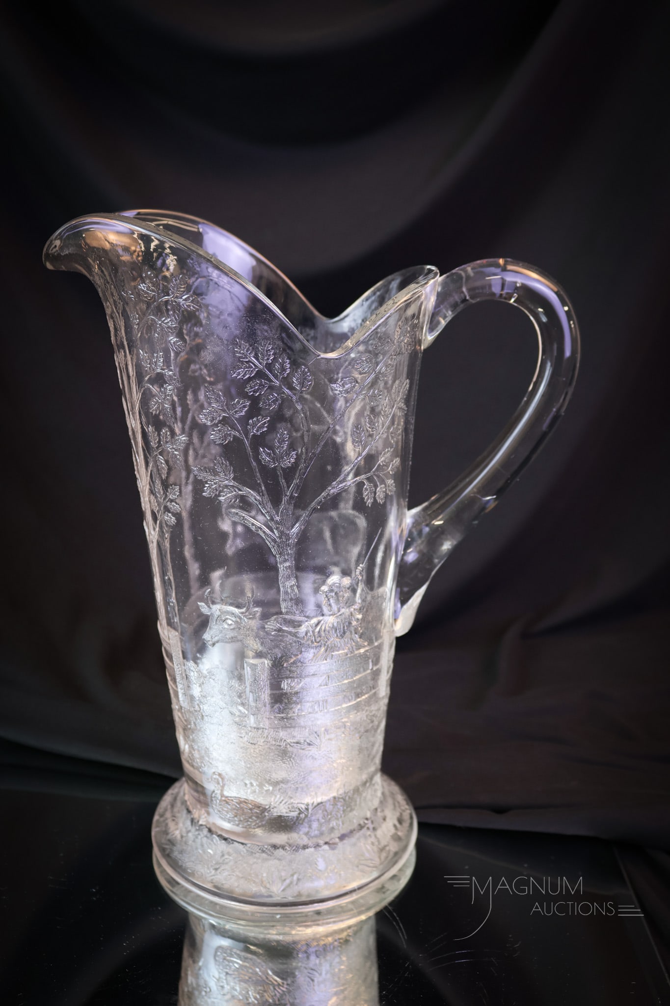 Dalzell "Bringing Home the Cows" Victorian Pattern Glass Water Pitcher: A select find in Victorian Dalzell glass. This is a "Bringing home the cows" pattern water pitcher. This fine piece is always a find! It measures 10 1/2" tall. Provenance: This item is from the privat