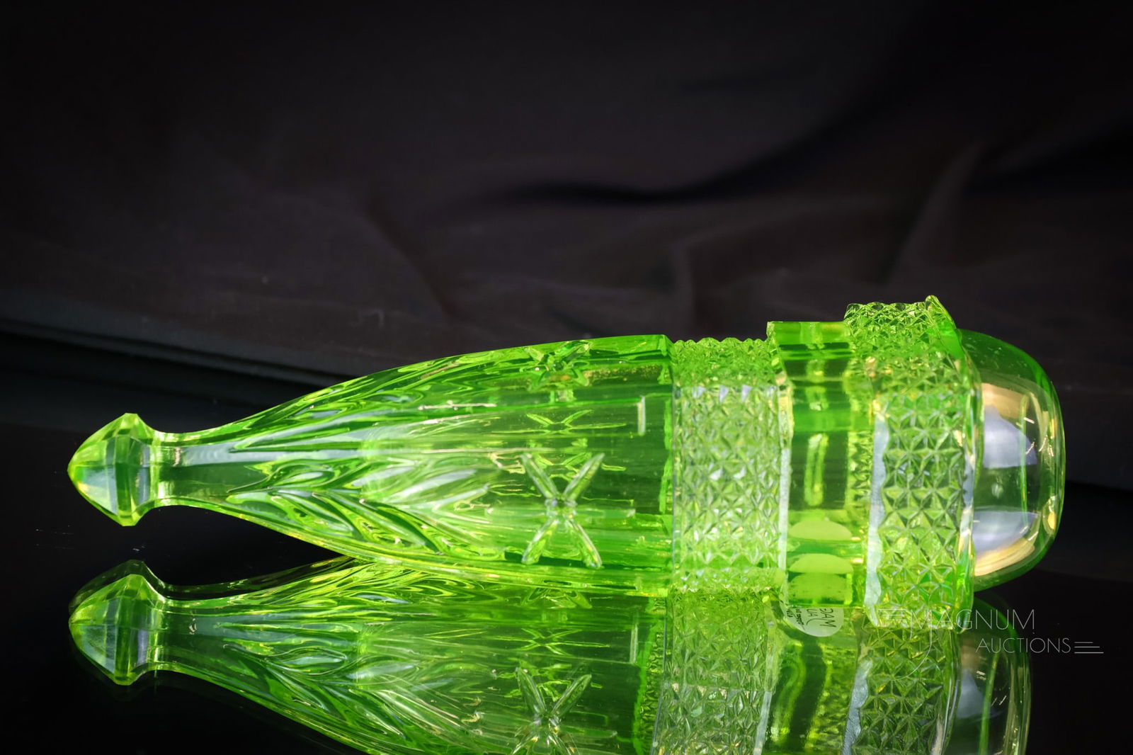 Vaseline Uranium Green Shiner Glass Car Vase: A vivid find in uranium glass. If you love a good shiner, then this one's for you. This will shine day and night. Sun or clouds. It will shine. This uranium-rich car vase is a fine and rarely seen pie