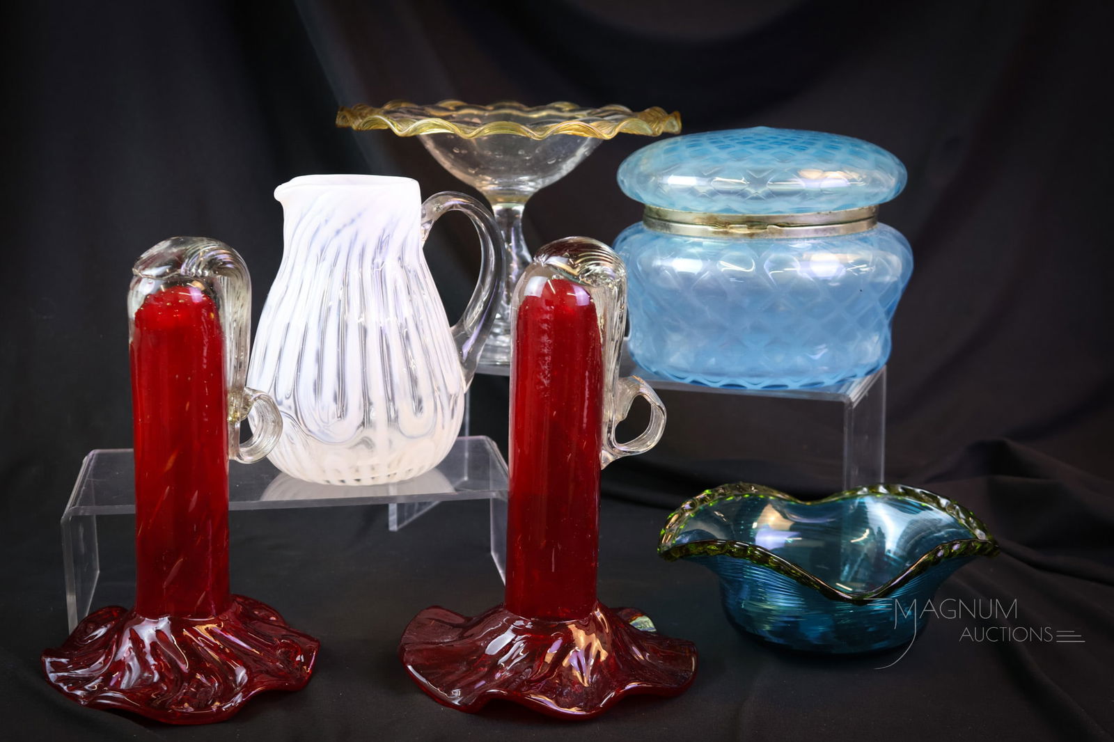 6 pc Lot "This is what dreams are made of" Collectible Glass: Six select finds in collectible glass. This lot includes a blue airtrap, mother of pearl jewelry casket. A cream white opal pitcher. A blue with amber glass bowl. A Fry controlled-bubble compote. Last