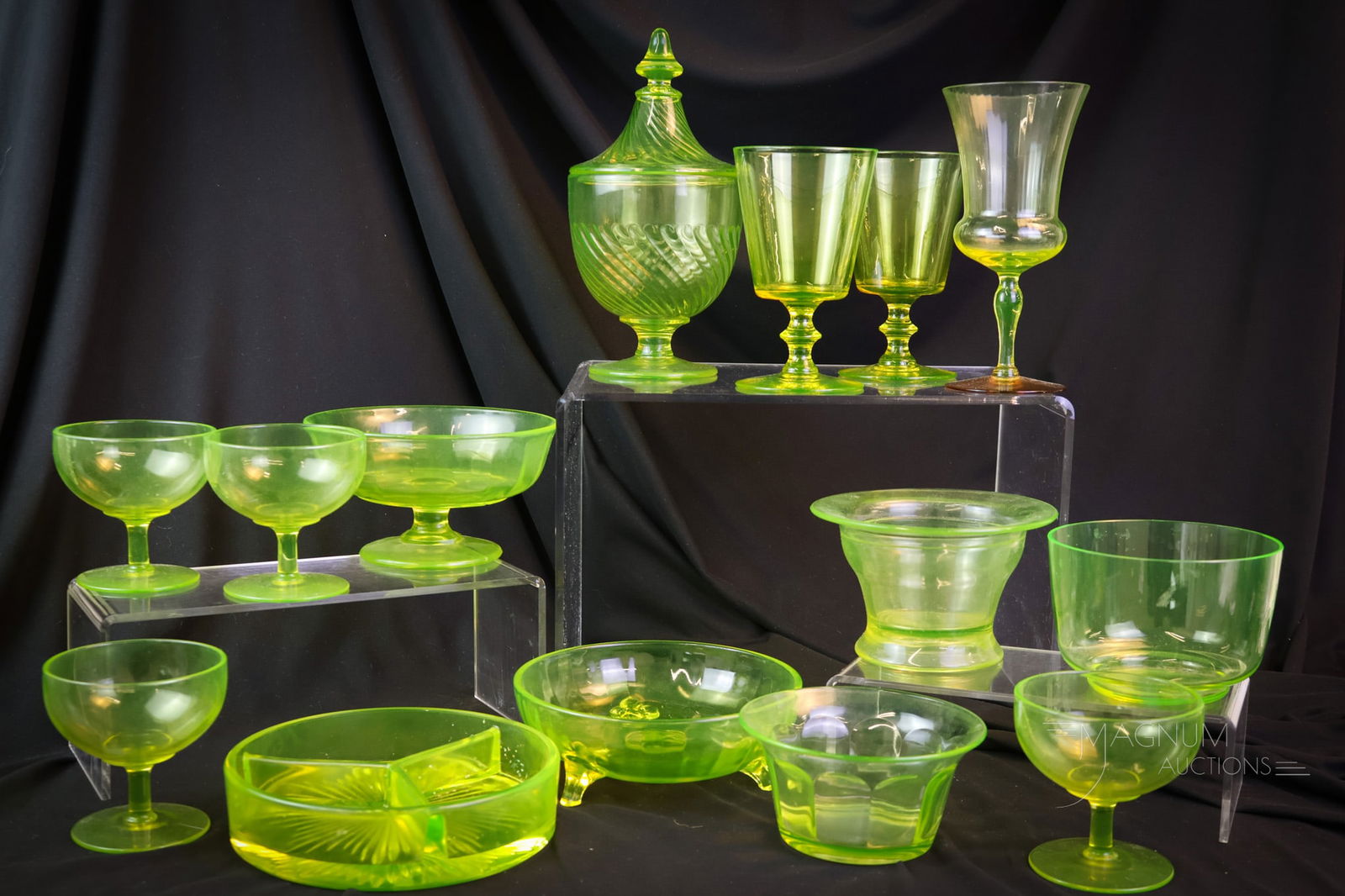 14 pc Lot Depression Era Vaseline Glass: Fourteen finds in Depression Era vaseline glass to delight you. The lot includes sherberts, goblets, and a candy dish. The tallest measures 9". SHIPPING NOTICE: If you choose not to utilize the LiveAu