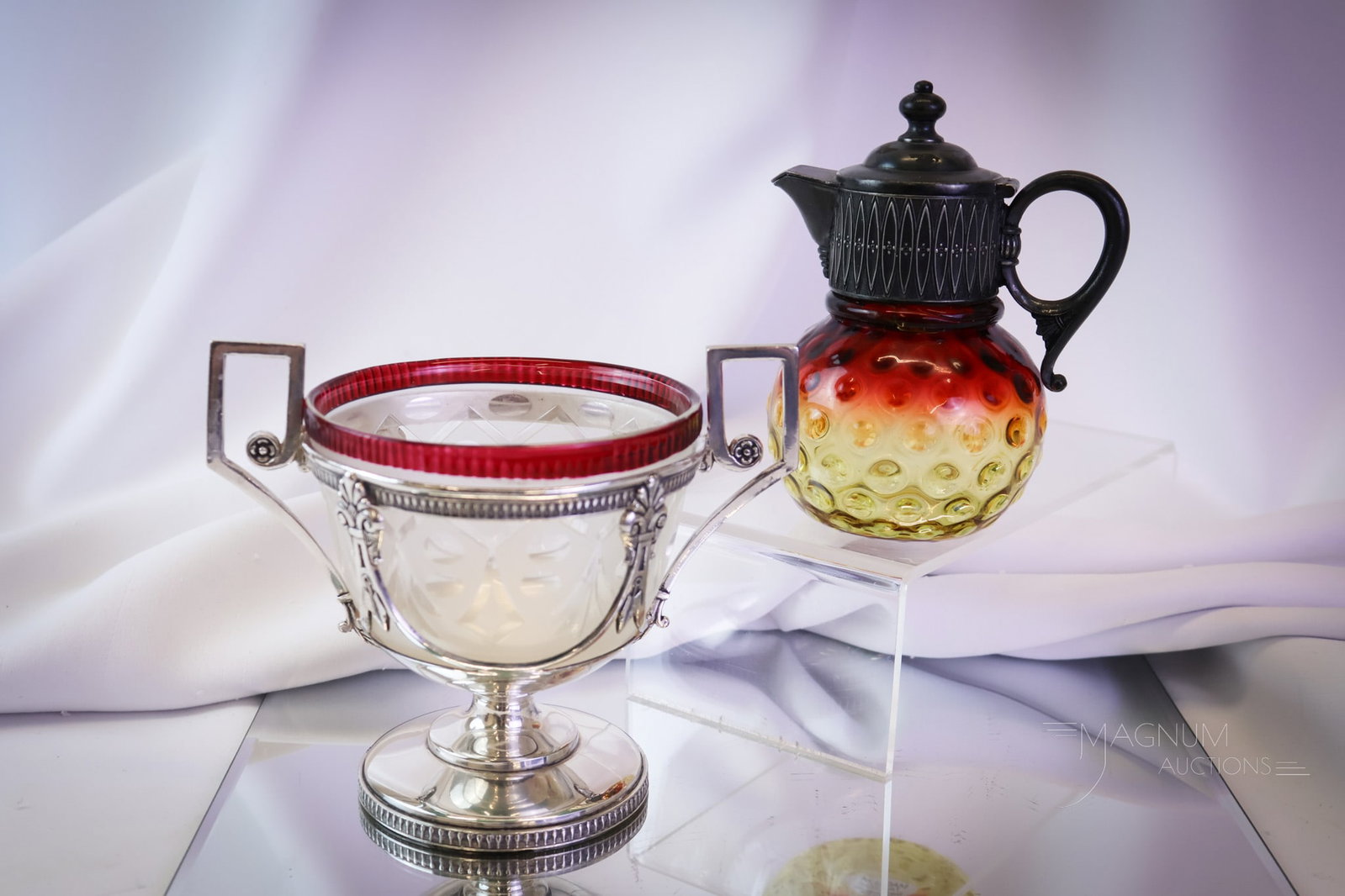2 pc Lot Mt. Washington Victorian Glass Amberina & Peppermint Stick: Two select finds in Victorian Mt. Washington glass. This lot offers a scarce amberina Hobnail syrup and a Peppermint stick spooner or sugar bowl in a silverplate frame. Each piece has lovely coloring.