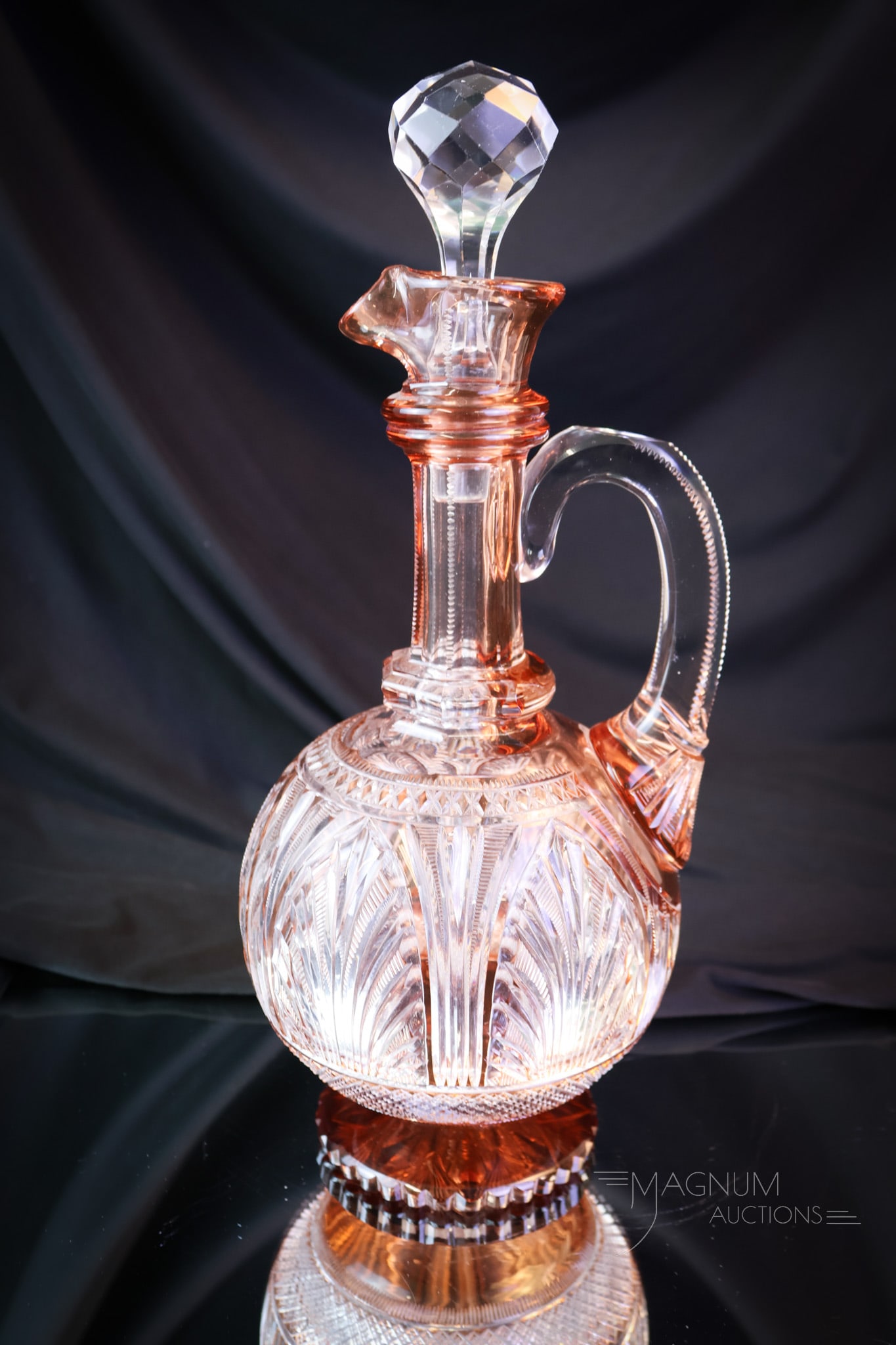 Stevens & Williams Cut Glass Claret Decanter: A magnificent Stevens & Williams persimmon cut to clear brilliant period cut glass claret decanter. This beautifully cut piece is intricately cut and detailed on every surface of the glass. It measure