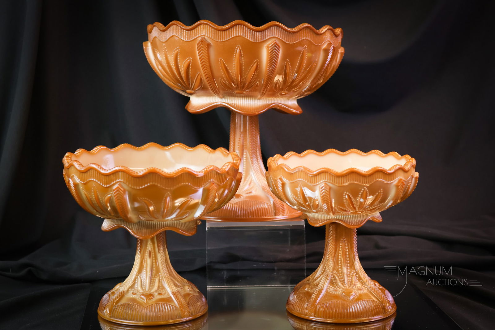 3 pc Lot Victorian Greentown Chocolate Glass Cactus Open Compotes: Three graduated sizes of the ever-popular Victorian Greentown chocolate glass pattern Cactus. Nice coloring on each. The tallest measures 7 3/4". The largest compote exhibits two chips on the connecti