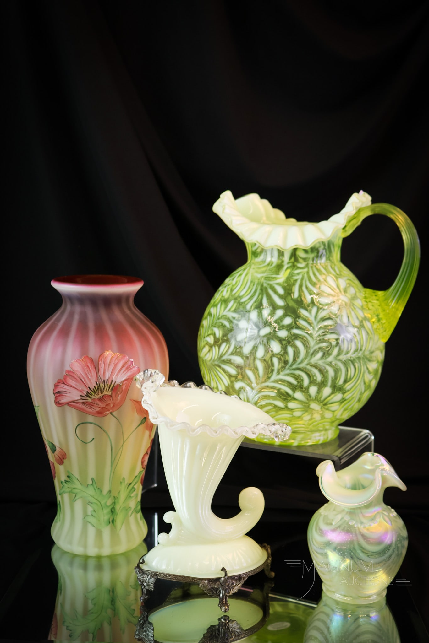 4 pc Lot Delights in Uranium Rich Fenton Art Glass: Four fine finds in uranium-rich Fenton Art Glass. This lot includes glowing examples in varianna. The first is a Topaz opal daisy and Fern water pitcher. The second is a hand-painted topaz amberina va