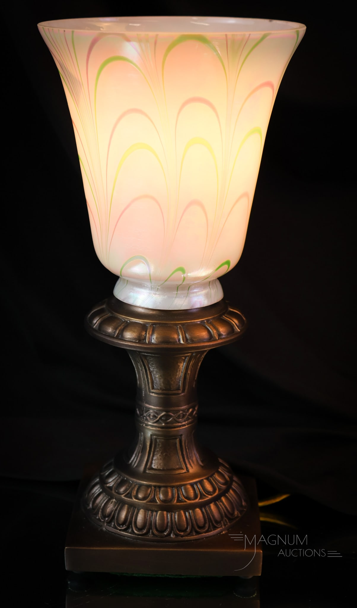 Fenton Art Glass Dave Fetty Boudoir Lamp: Here's a beautiful find that would be a welcome addition to your collection! This is a Fenton Art Glass Dave Fetty boudoir lamp. The lamp has an iridescent shade with green and pink loops. The piece i