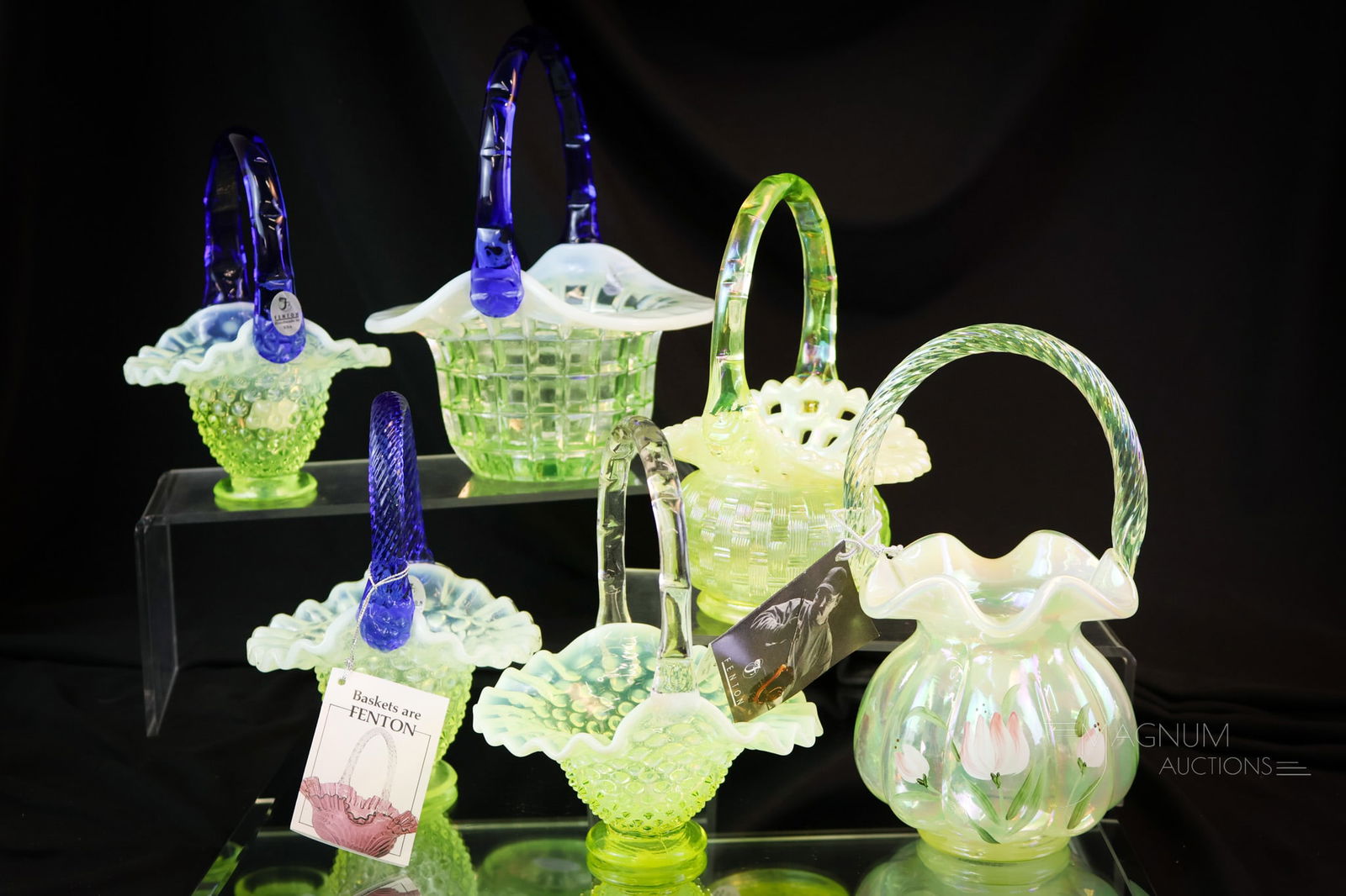 6 pc Lot Fenton Uranium Vaseline Opalescent Art Glass Baskets: Six delightful, glowing finds in Fenton Art Glass for your bidding pleasure. This lot includes 6 baskets. Three have cobalt handles. One is hand-painted. The tallest measures 8". SHIPPING NOTICE: If y