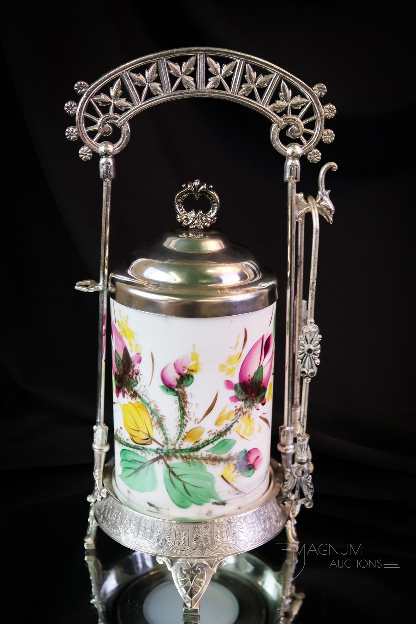 Fenton LG Wright Art Glass Moss Rose Pickle Castor: A fine Fenton for L.G. Wright Moss Rose pattern pickle castor. The jar resides in a silverplate signed Rogers frame. The castor measures 11" tall. SHIPPING NOTICE: If you choose not to utilize the Liv