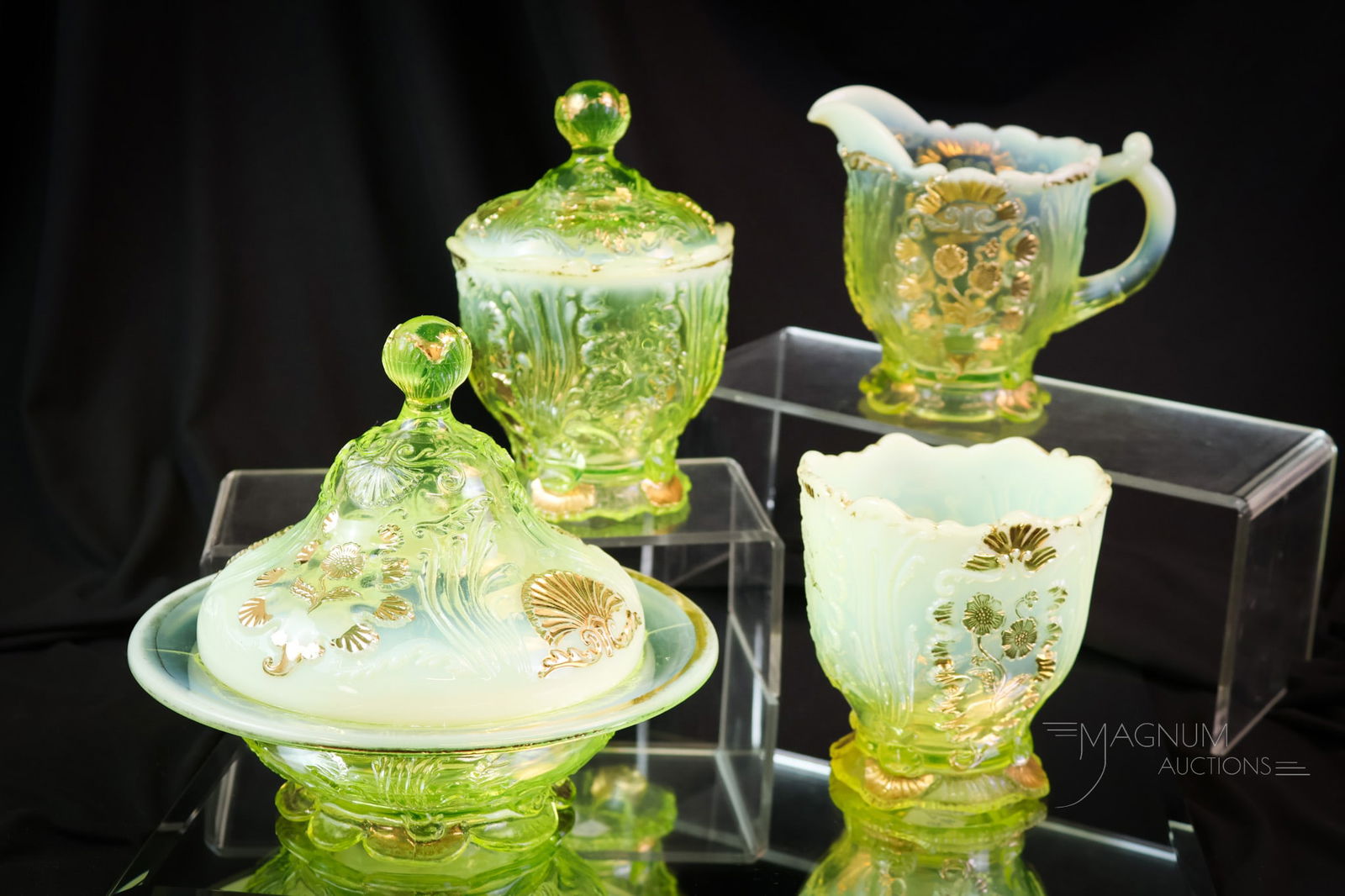 4 pc Northwood Uranium Vaseline Opalescent Glass Everglades Table Set: Another glowing find in Victorian uranium vaseline opalescent glass. This is a table set by Northwood in the Everglades pattern. It is highlighted with gilt decoration. The tallest measures 6 1/2".