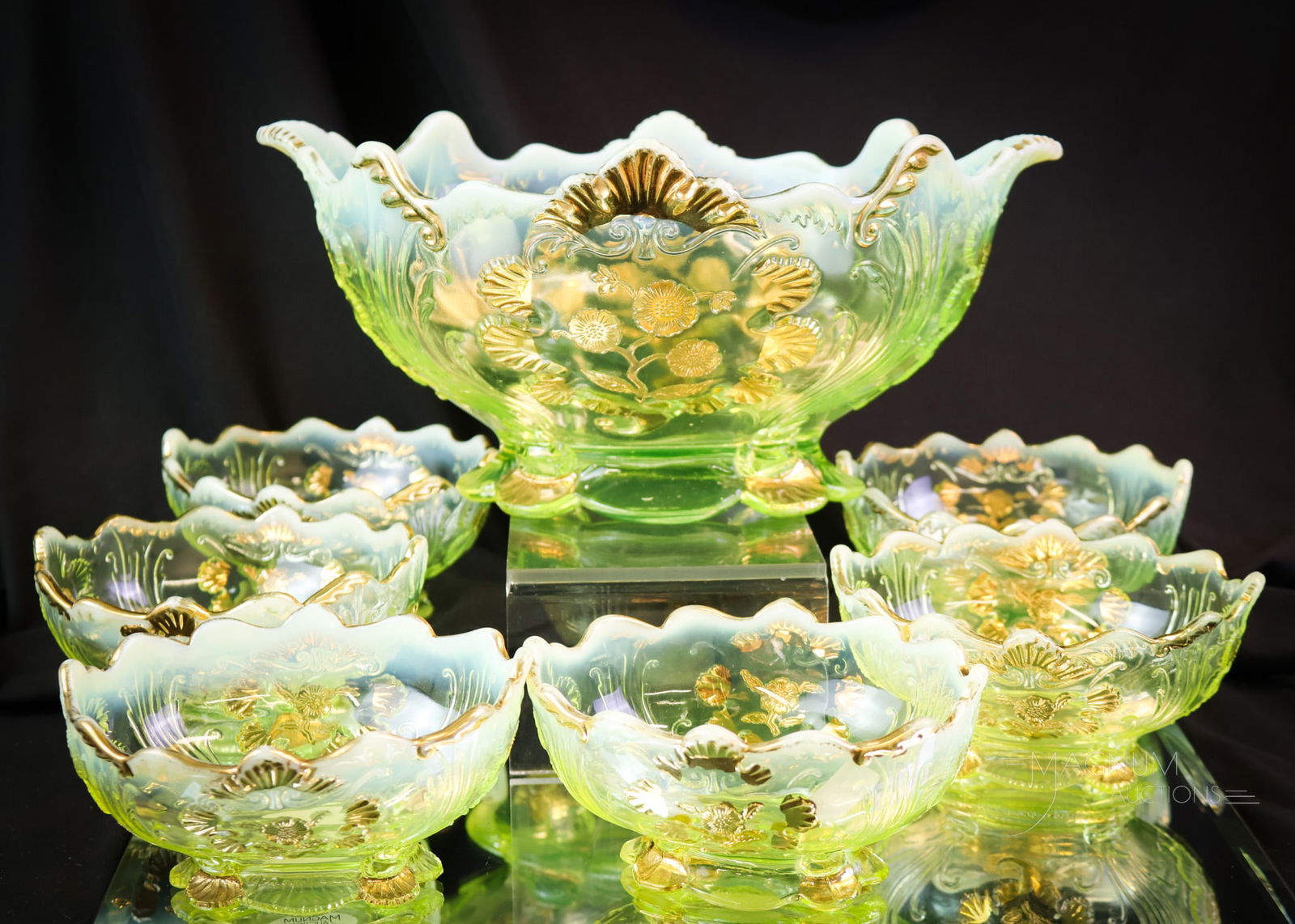 7 pc Set Northwood Uranium Vaseline Opalescent Everglades Victorian Berry Set: A fine and complete set in the Northwood uranium-rich vaseline opalescent coloring. This set in the Everglades pattern features a master berry bowl and six individual bowls. The tallest measures 5".