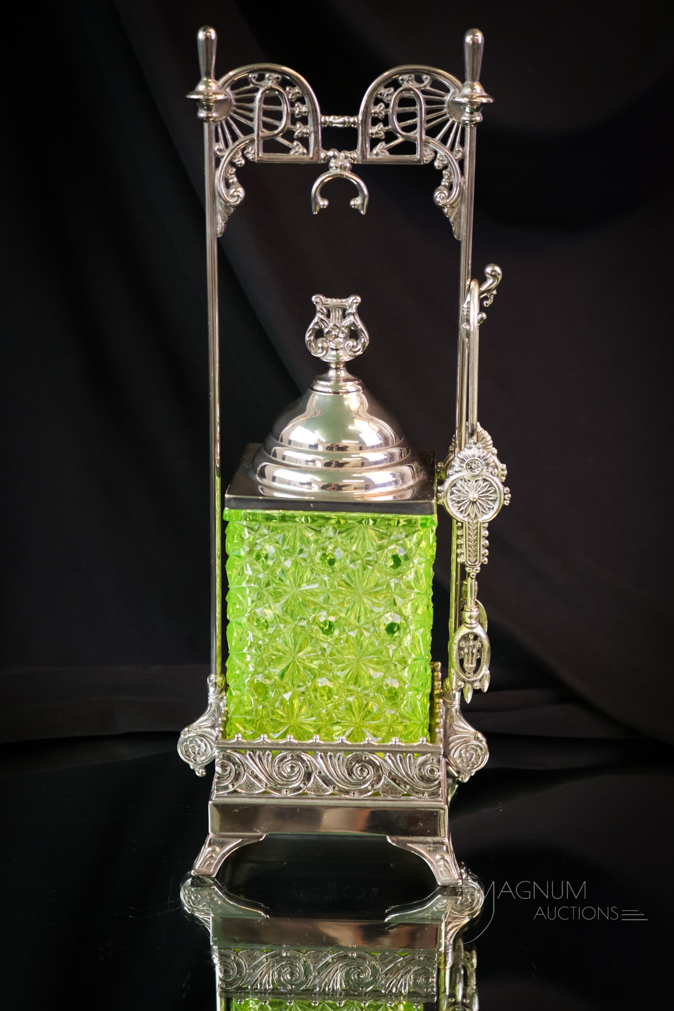 Exceptionally Rare Aurora Square Uranium Vaseline Glass Daisy & Button Silverplate Pickle Castor: An exceptionally rare find here, folks! This is an all-original Square daisy & Button pattern uranium-rich vaseline pickle castor complete with its original lid and frame. This ornate castor will be t