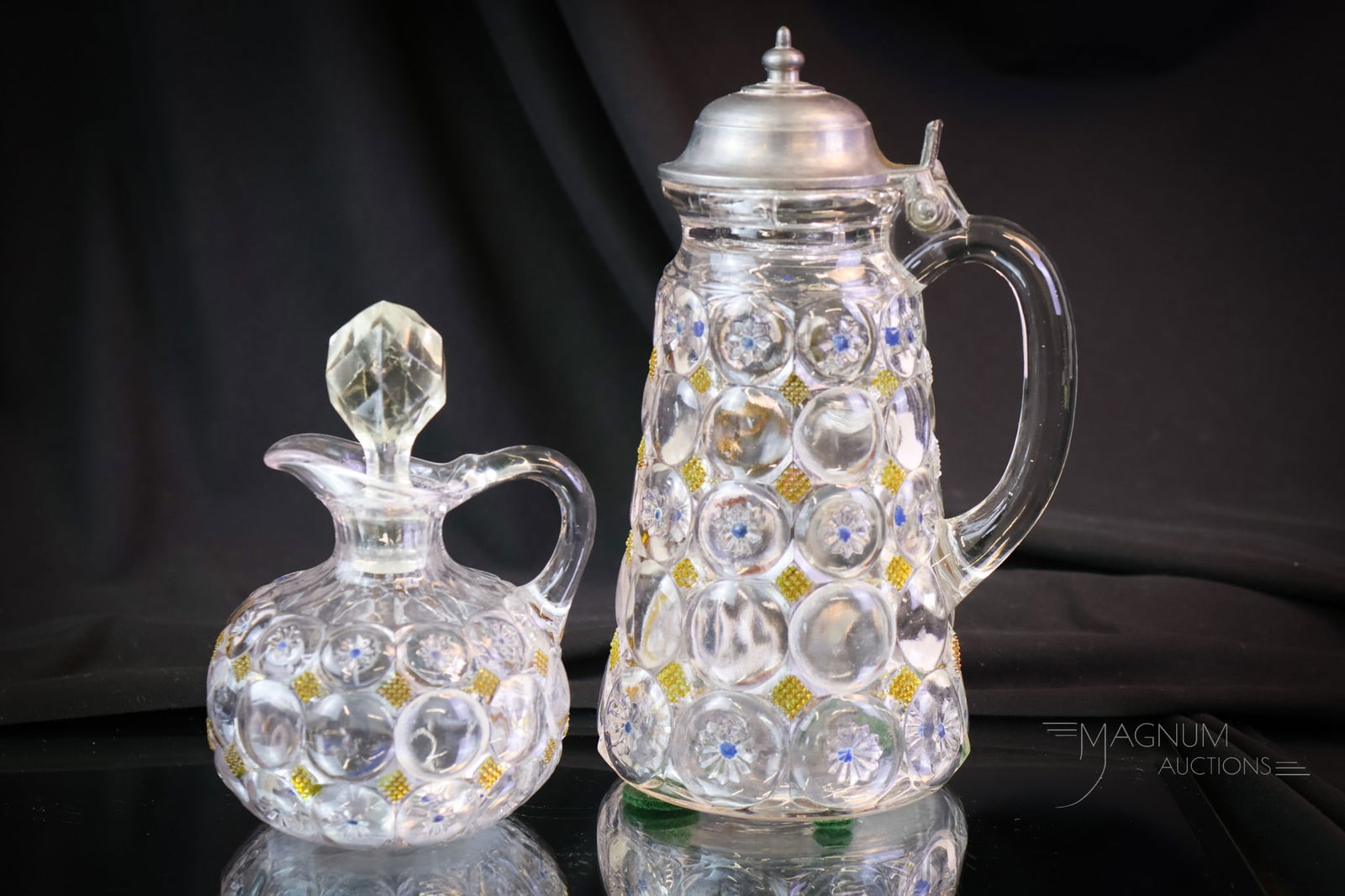 Victorian Co-operative Flint Glass Jeweled Moon & Star Syrup & Cruet: Two selections offered for your bidding pleasure. Here is a Co-operative Flint Victorian glass Jeweled Moon & Star pattern cruet and syrup pitcher. Both pieces have decoration in amber and blue. A wel