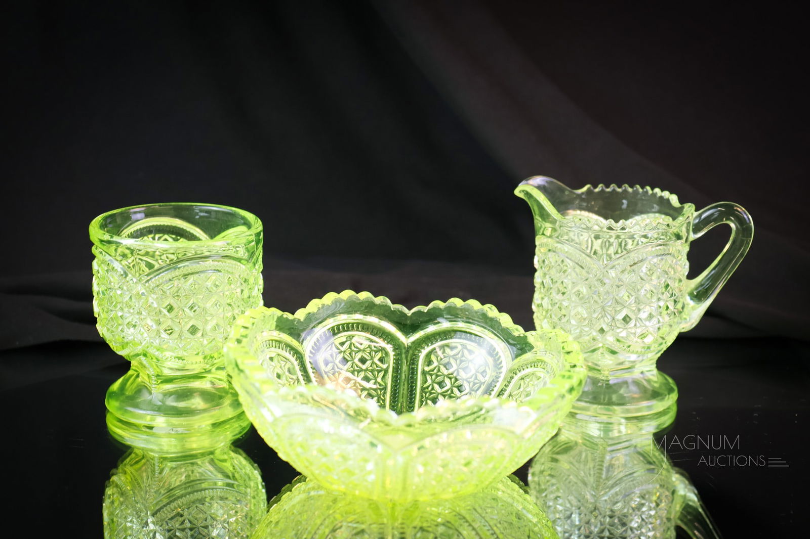 3 pc Lot Greentown Victorian Uranium Vaseline Austrian Glass: Three sought-after finds in uranium-rich Victorian vaseline Greentown glass. This lot includes a child's creamer, a sugar base, and a berry bowl in the Austrian pattern. The tallest measures 3". SHIPP