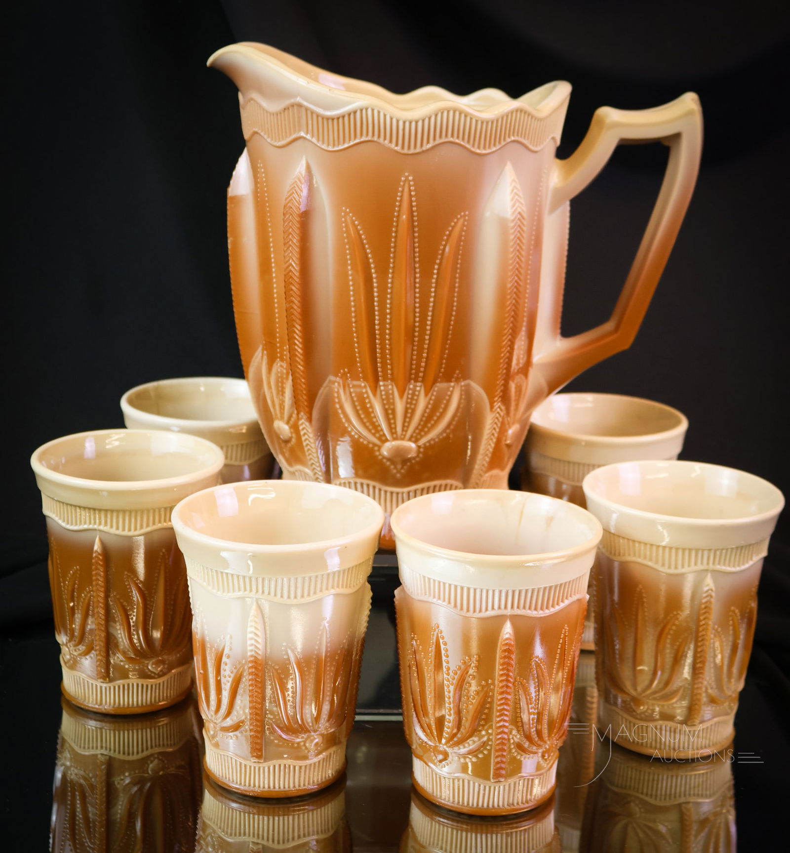 7 pc Victorian Greentown Chocolate Glass Cactus Water Set: A fine and complete set in the Cactus pattern by Greentown Glass. This Victorian-era pitcher and tumbler set would certainly be collection-enhancing for you. The tallest of the seven-piece set measure