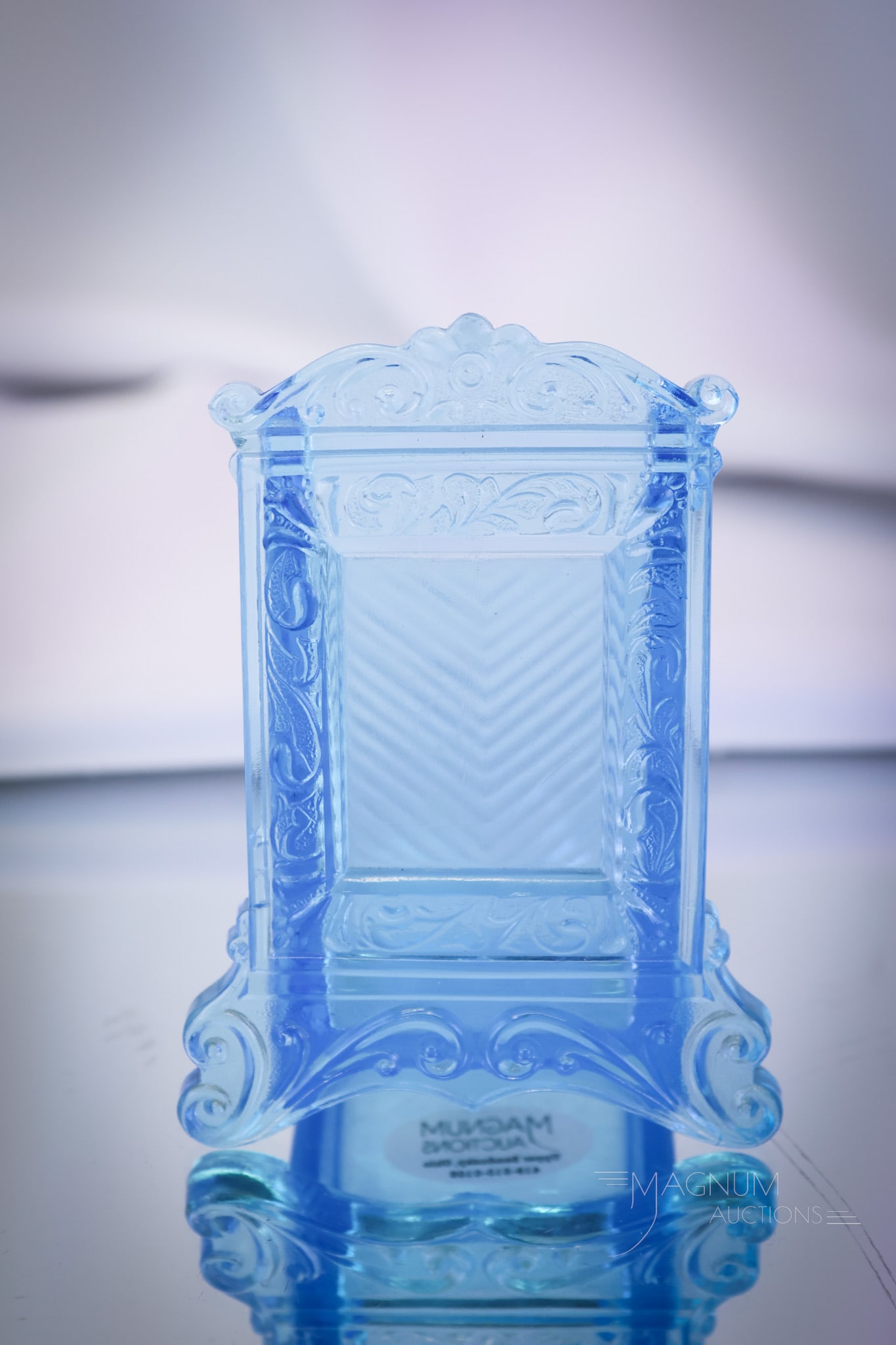 Greentown Blue Picture Frame Victorian Glass Tootpick Holder: A brilliant blue Greentown Victorian toothpick holder in the Picture Frame pattern. Always a find for your collection. This sweet piece measures 3 1/2" tall and 2 3/4" wide. Minor roughness on the top
