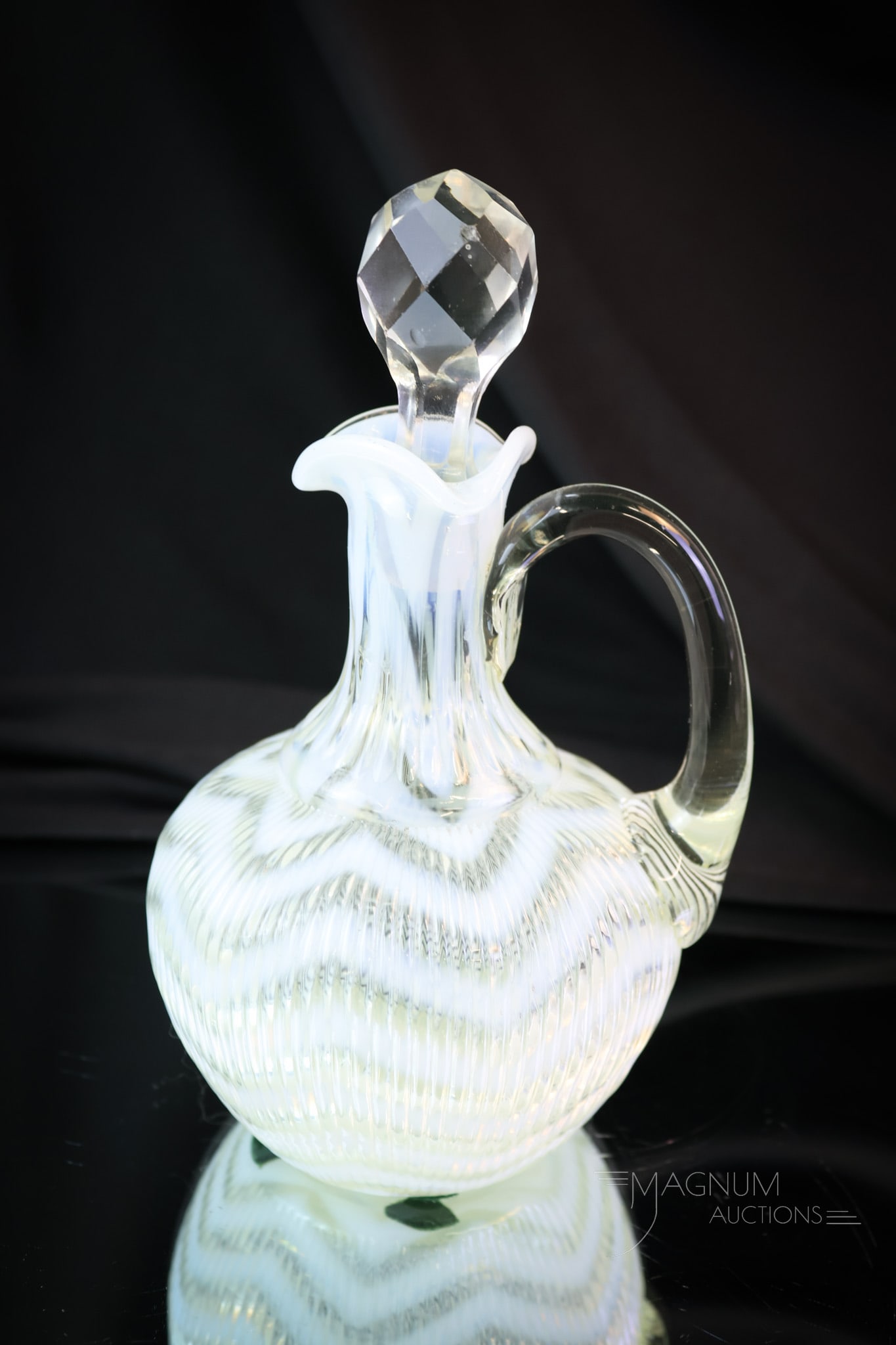 Northwood Ribbed Herringbone Victorian Opalescent Glass Cruet: A fine example of the Northwood Ribbed Herringbone pattern in a cruet. This cruet has heavy opal and a finely ribbed pattern. The cruet measures 6 1/2" tall. SHIPPING NOTICE: If you choose not to util