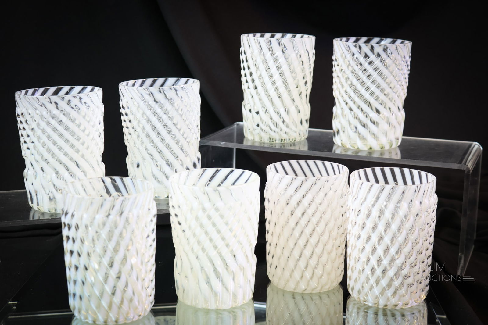 8 pc Lot Victorian Opalescent Glass Tumblers: This lot consists of four Chrysanthemum Base Swirl tumblers and four Reverse Swirl pattern tumblers. All our in white opalescent glass. The tallest measures 3 3/4" high. SHIPPING NOTICE: If you choose