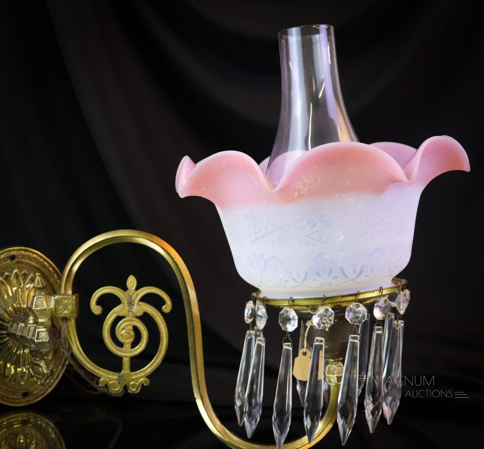 Victorian Opalescent Engraved Floral Glass Wall Sconce: A nice find in our auction. This is a solid brass wall sconce complete with an opalescent satin floral-engraved shade. The sconce is brass, and it is wired for electricity. The sconce is complemented