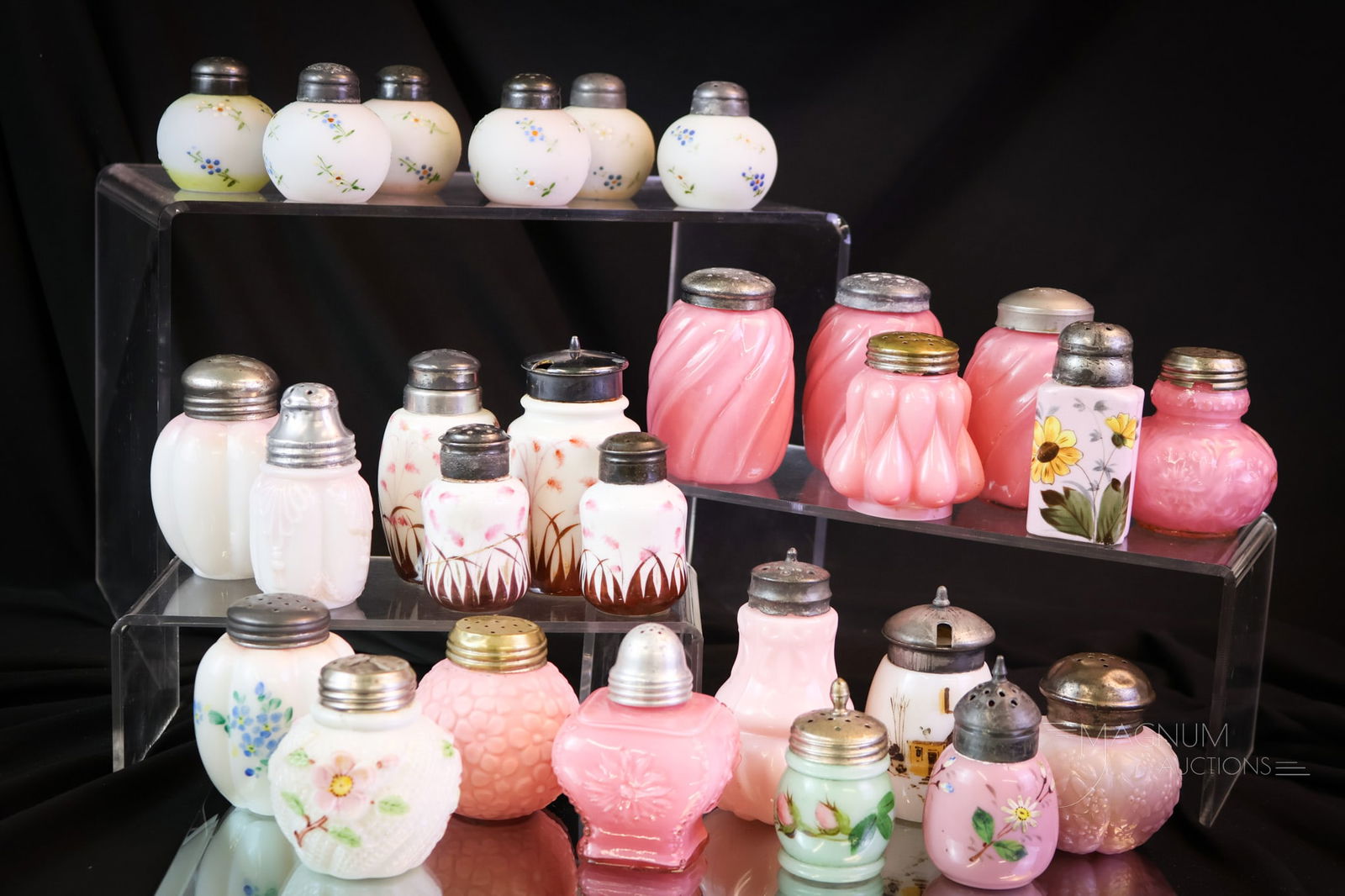 28 pc Lot Victorian "Collection of Pinks" Salt Shakers: This way more than generous lot offers shakers with one thing in common. The color pink! Glass and porcelain shakers make up this lot. The tallest of the offering measures 3 1/2". SHIPPING NOTICE: If