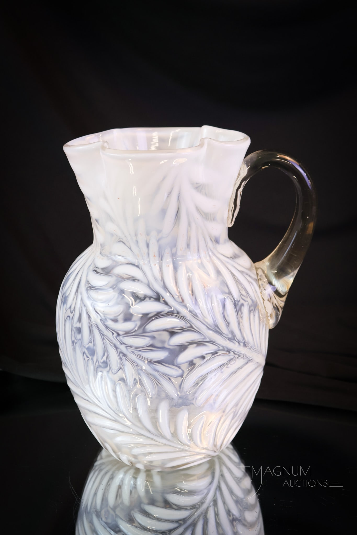 Victorian Opalescent Clover-Top Fern Water Pitcher: A seldom found color for this pitcher. This is a Victorian fern pattern water pitcher. The pitcher features a clover-top rim. The pitcher measures 8 3/4" tall. SHIPPING NOTICE: If you choose not to