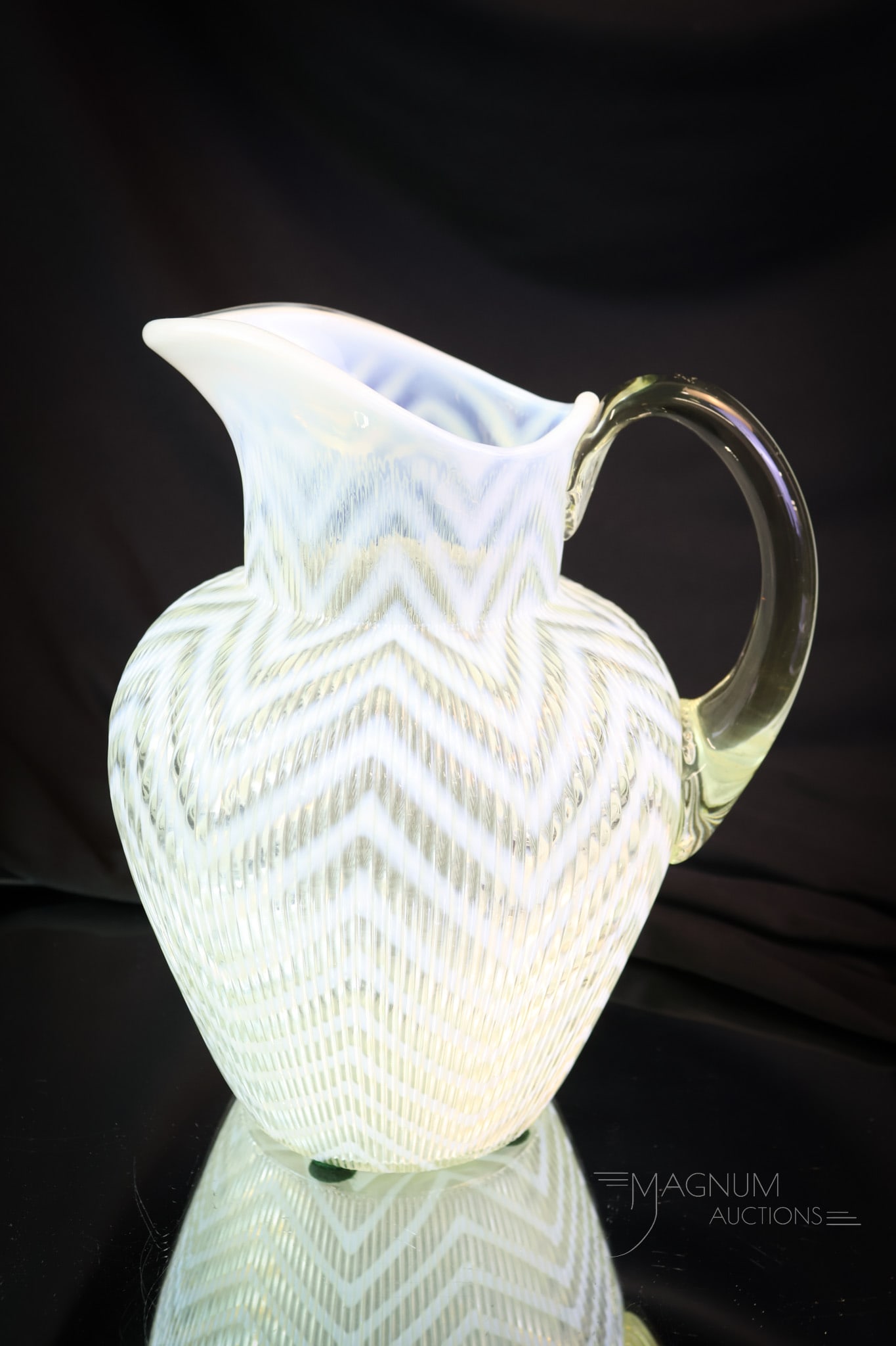 Scarce Northwood Victorian Ribbed Herringbone Glass Water Pitcher: A scarce find in the Northwood Ribbed Herringbone pitcher. This pitcher is in crystal opal. A fine example with heavy opal and excellent clarity. The pitcher measures 8 1/2" tall. SHIPPING NOTICE: If