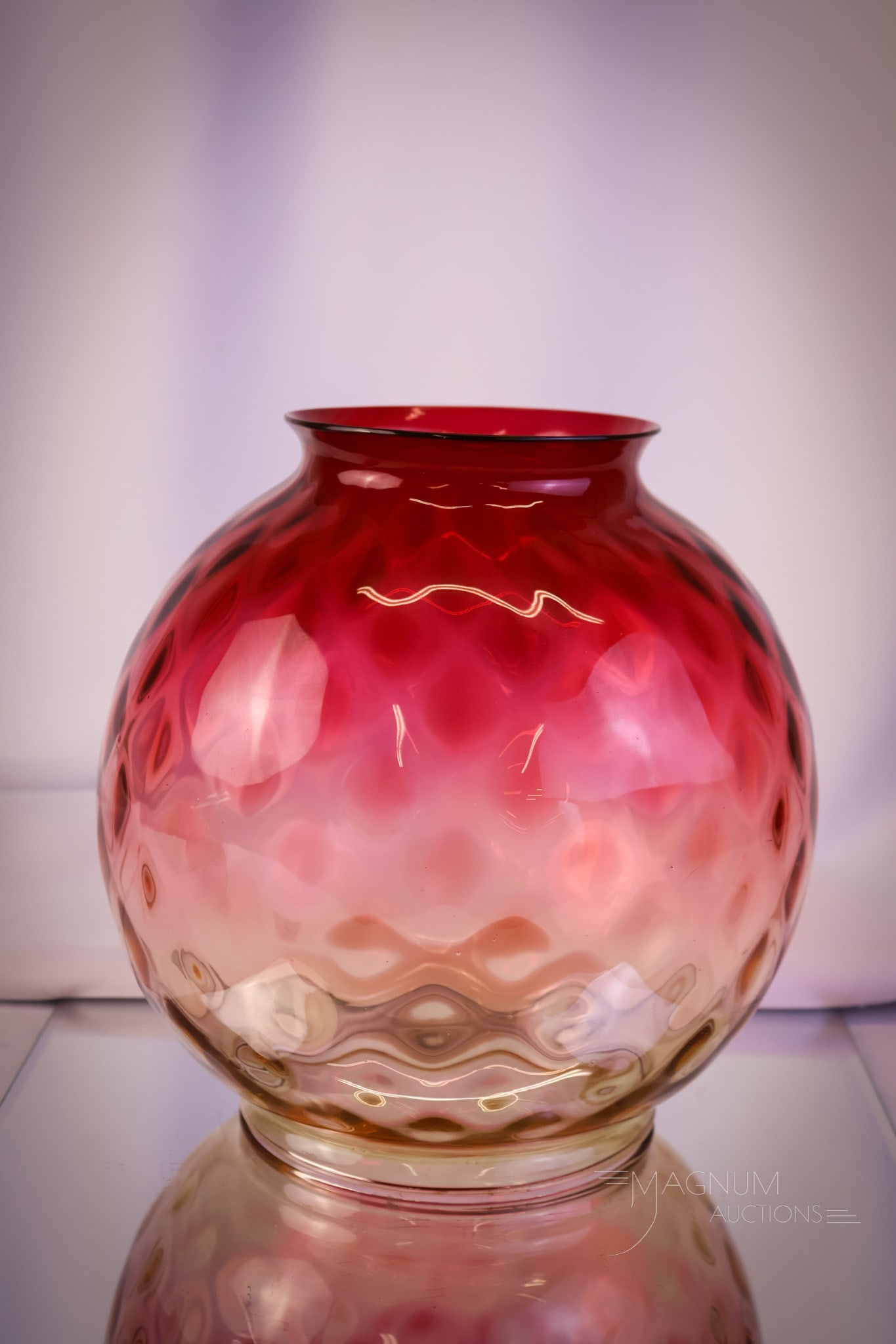 Rare Victorian Amberina Art Glass Hall Shade: A rare find in Victorian amberina glass. This is a ball shade for a hall lamp. This piece has excellent coloring and is in the Inverted Thumbprint pattern. The shade measures 9" tall, 8 1/2" wide, and