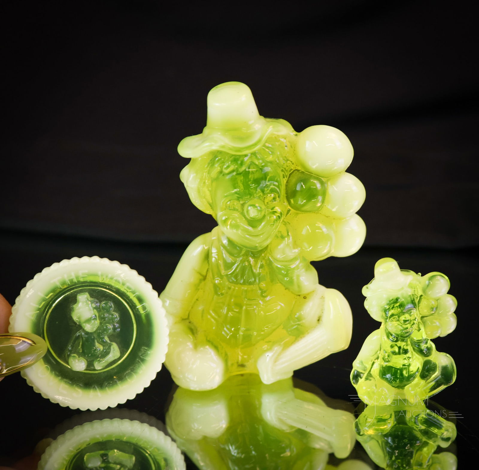 3 pc Lot Mosser Uranium Vaseline Opalescent Glass: Three fine examples of Mosser uranium-rich vaseline glass. We know how you all like clowns. This lot offers three. The first is a figurine. The second is a mini-figurine. The third example is a clown-