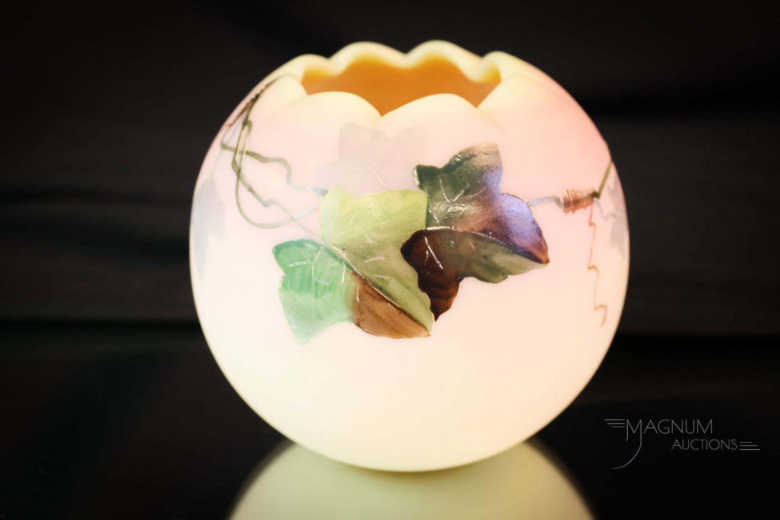 Webb Burmese Victorian Glass Ivy Rose Bowl: A Webb burmese Victorian glass rosebowl with decoration of English Ivy foliage around the body. The rose bowl measures 3" tall. SHIPPING NOTICE: If you choose not to utilize the LiveAuctioneers LiveSh