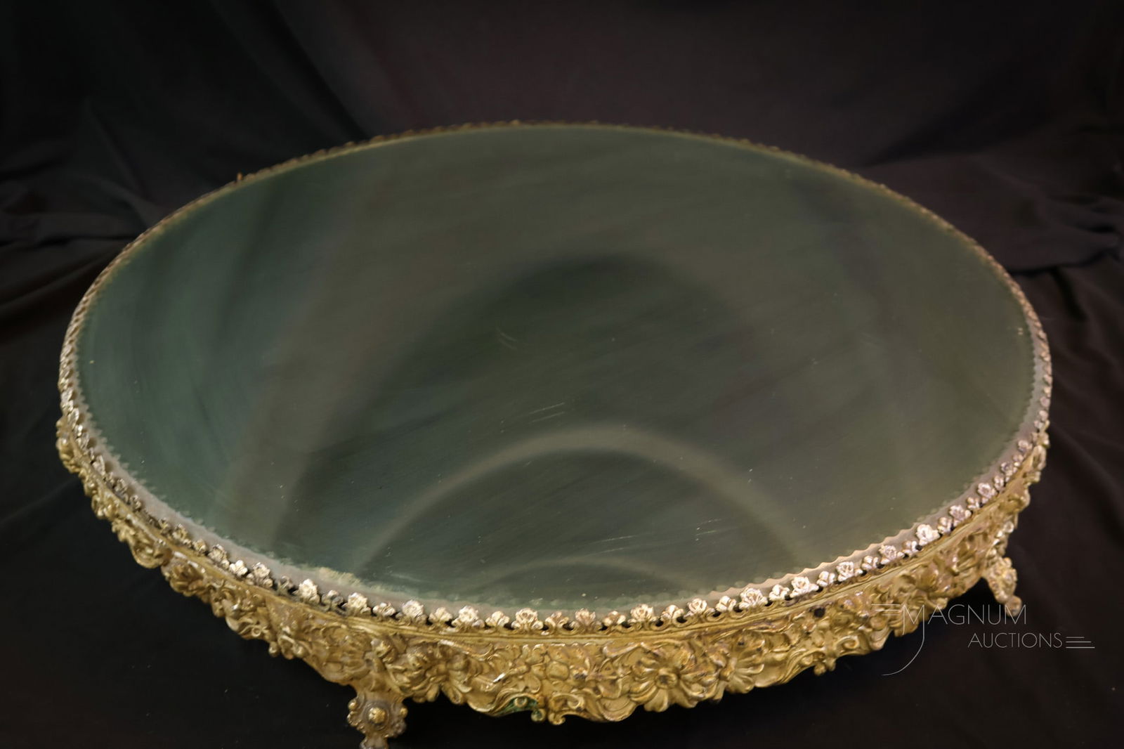 Monumental 20 Silverplate Plateau Mirror: A monumental find for showcasing that super special piece in your collection or a centerpiece for your dining table. This silverplate plateau mirror measures 20" in diameter. The silverplate features