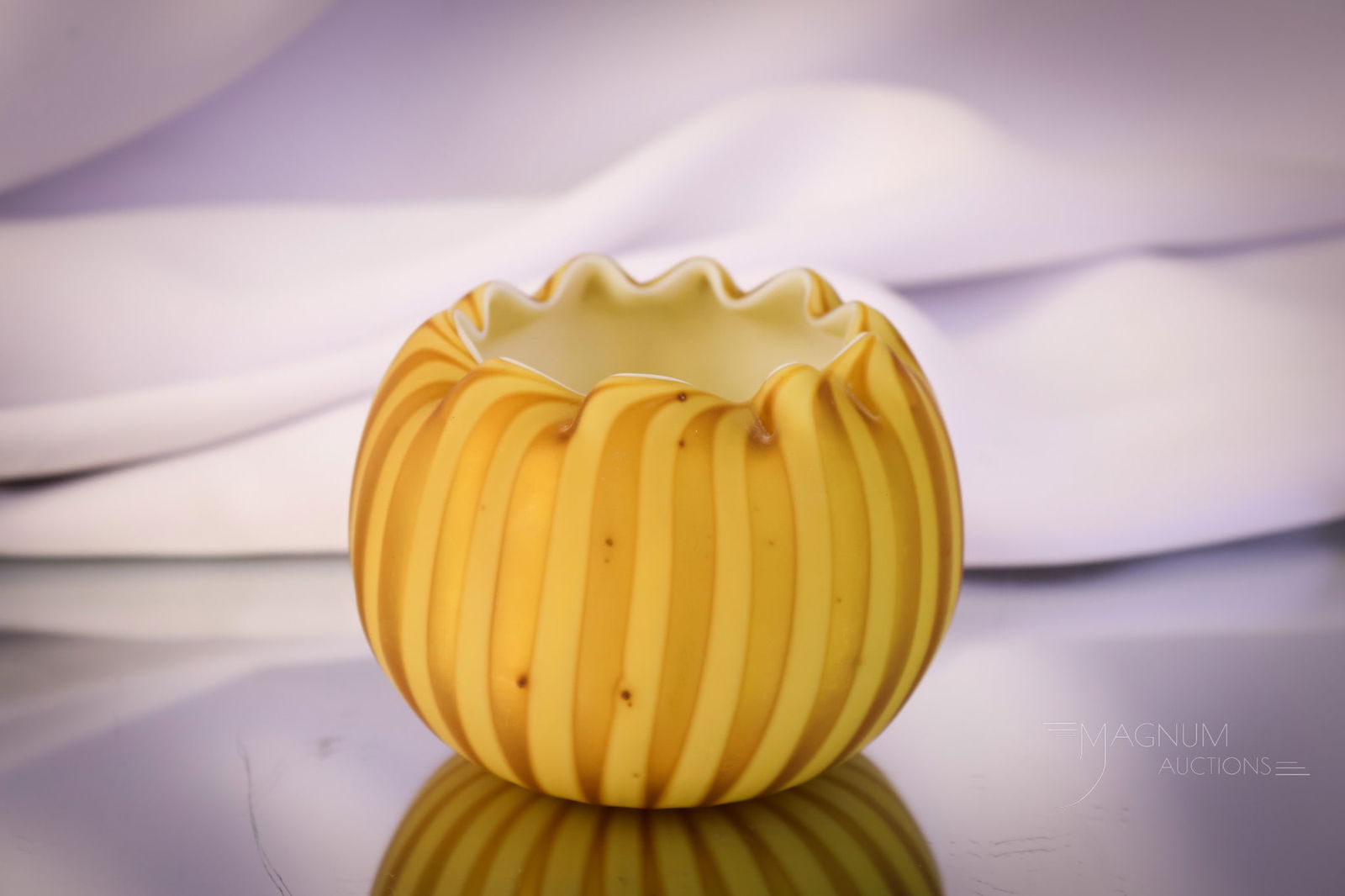 Golden Victorian Mother of Pearl Satin Uranium Glass Rose Bowl: A perfect addition for your collection. This is a golden squash colored Victorian rose bowl in satin mother-of-pearl glass. This fine little example measures 2 3/4" tall. The interior glows brightly w