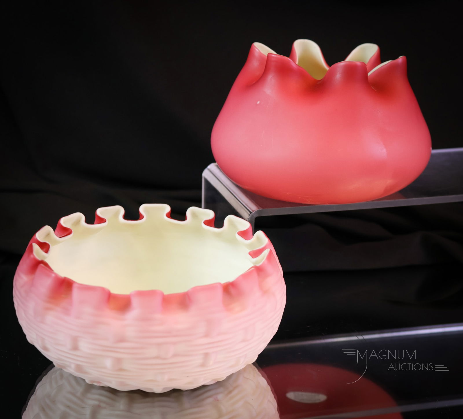 2 pc Lot Victorian Stevens & Williams Art Glass Rose Bowls: Two delights in Victorian rose bowls attributed to Stevens & Williams. The first is a basketweave with a box pleated top rim. The second is a pink satin with a star-crimped top rim. The tallest measur