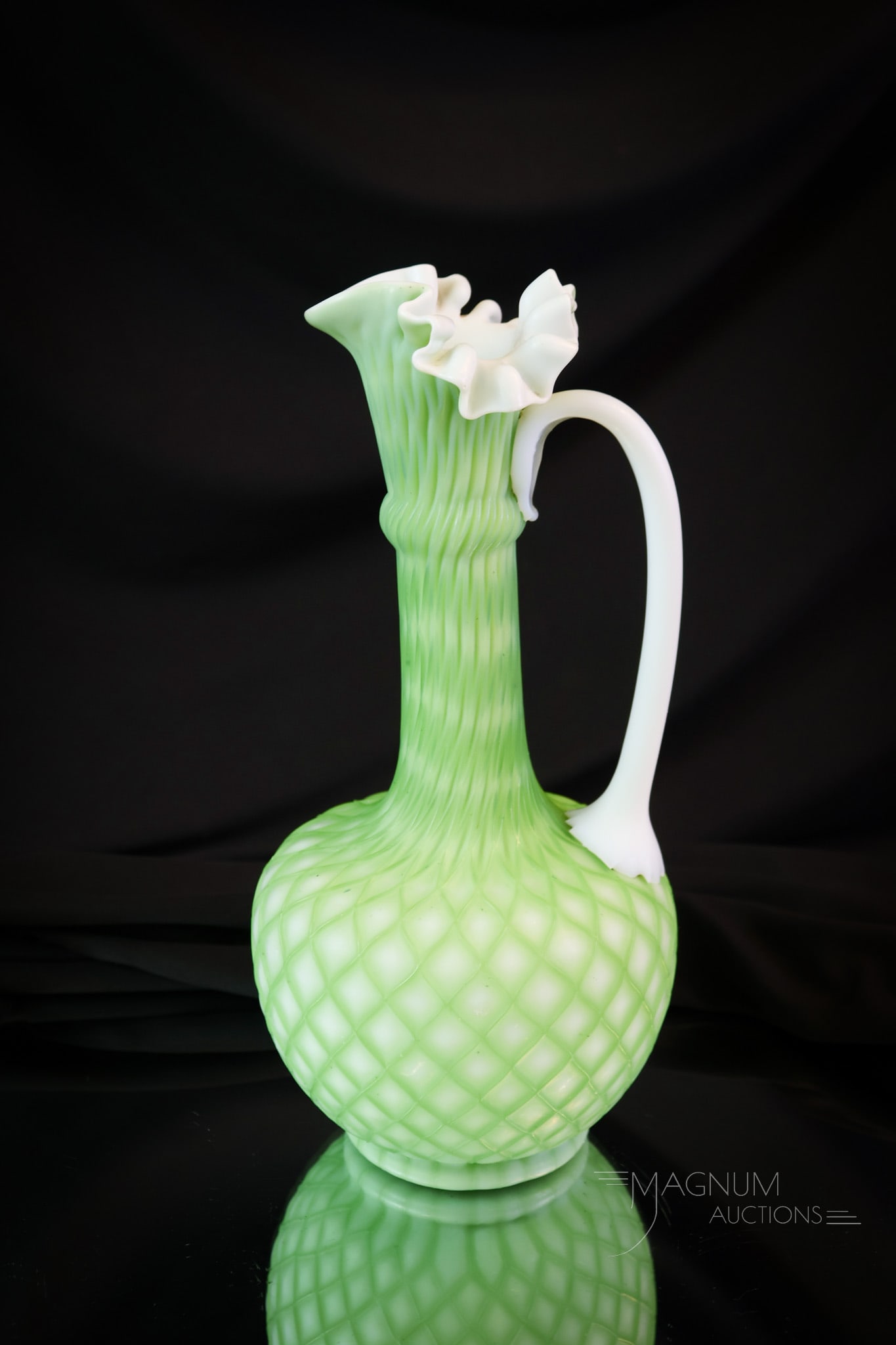 Rare Victorian Green Cut Velvet Art Glass Ewer: A rare find in Victorian art glass. Seldom do you Cut Velvet in this form or this celery green coloring. This ruffled top ewer measures 10 3/4" tall and 5" wide. SHIPPING NOTICE: If you choose not to