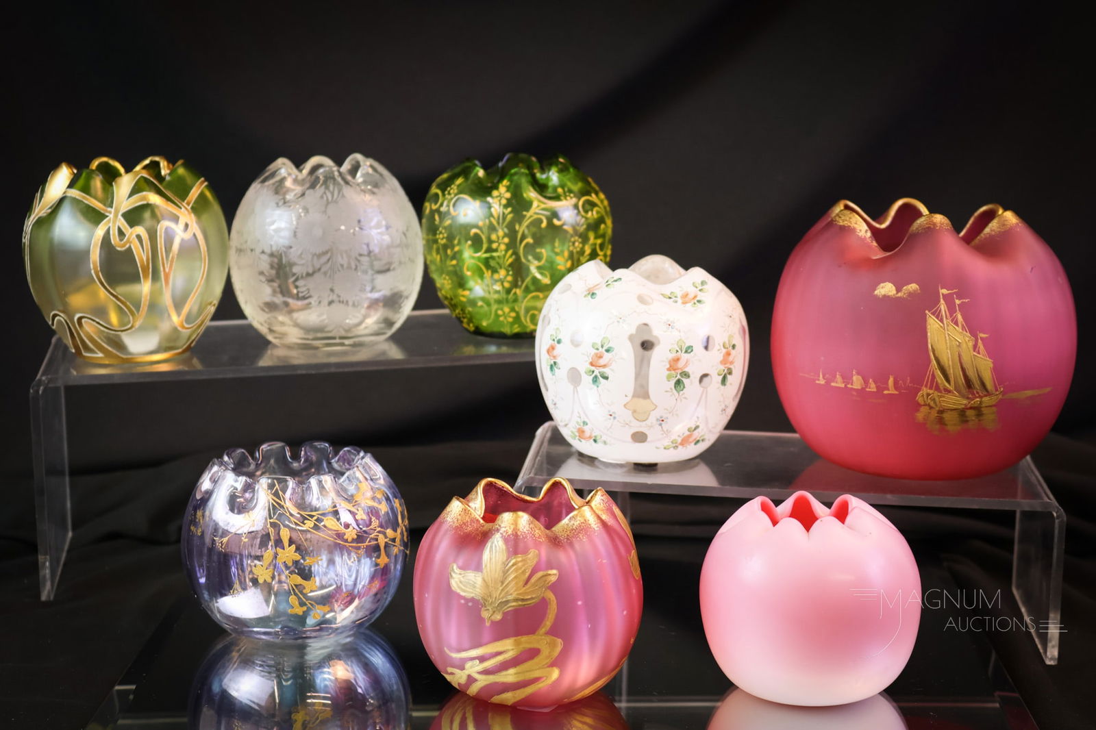 8 pc Lot Victorian Art Glass Rose Bowls: Eight truly collection-enhancing Victorian art glass rose bowls. This lot includes two in cranberry satin with gold decoration. Four enamel-decorated examples. One that's clear and engraved. The last