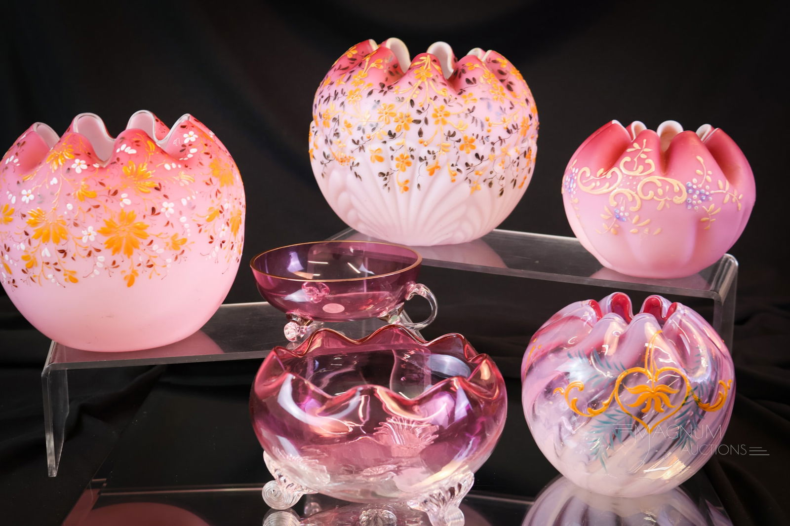 6 pc Lot Victorian Art Glass Rose Bowls: Six wonderful examples of various art glass rose bowls for your bidding pleasure. This lot includes three pink satin enameled examples. A cranberry opal enameled example. The last two are footed Rubin