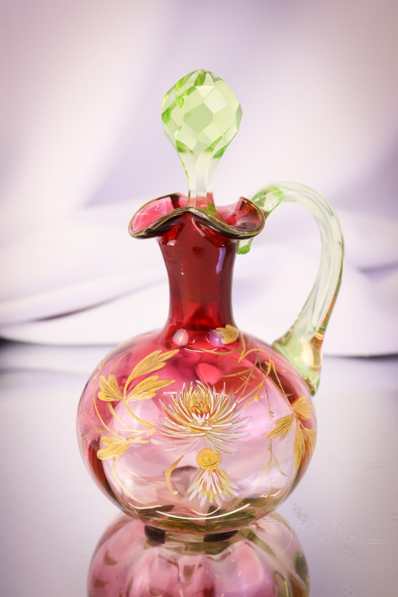 Rubina Verde Victorian Cranberry Vaseline Uranium Glass Cruet: A wonderful shiner for your bidding pleasure! This lovely art glass cruet features a cranberry cased in vaseline glass body with applied green handle and stopper. This bad boy lights up under black li