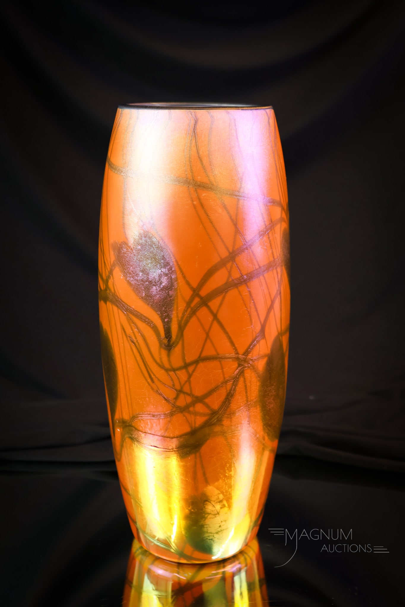 Imperial Freehand Orange Iridescent Heart & Vine Vase: Another super example of Imperial art glass. This exciting example is in an orange iridescent glass body with a deep blue heart and vine decoration and an applied rim. The vase measures 11" tall. SHIP