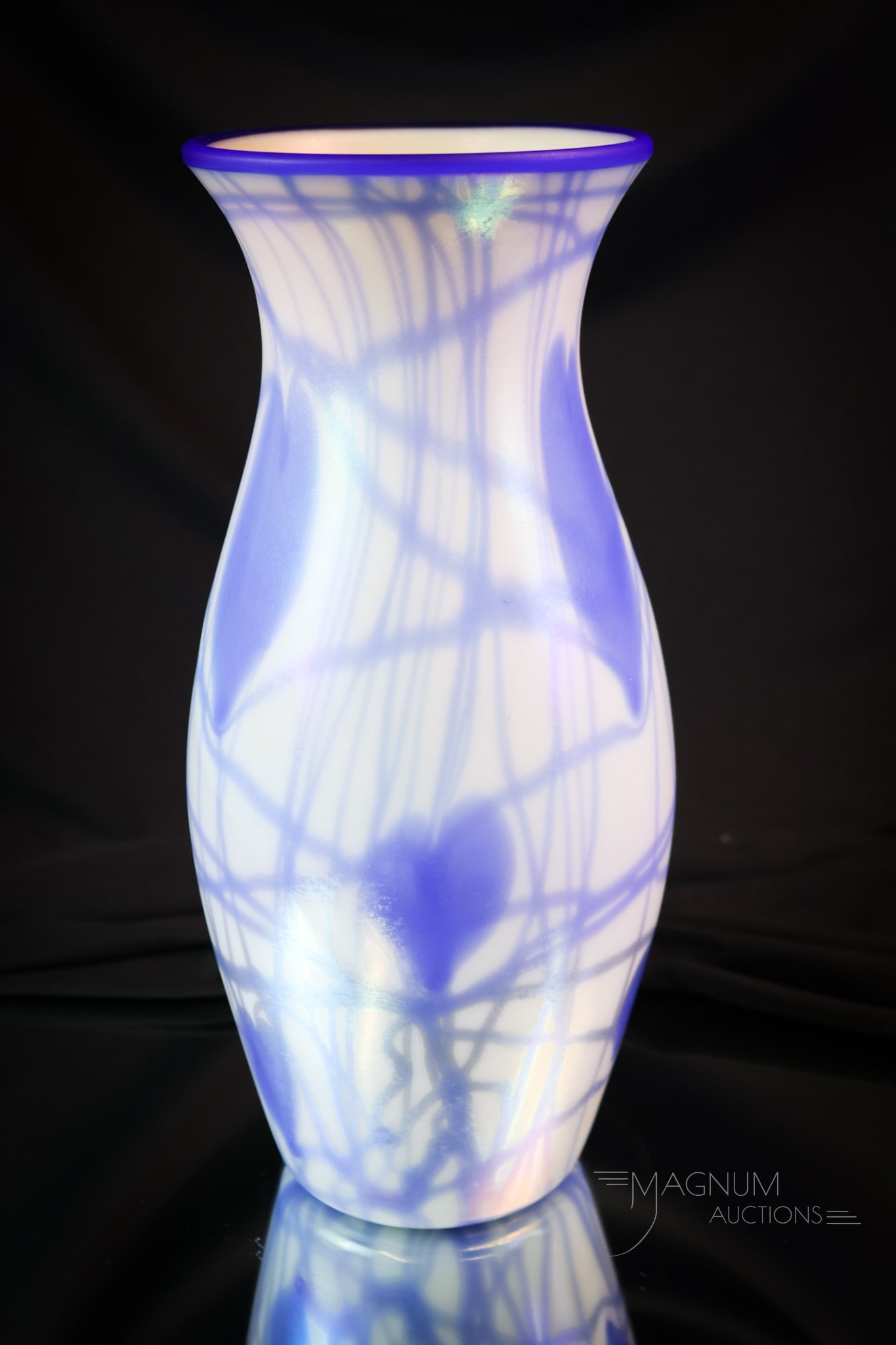 Imperial Freehand Iridescent Art Glass Heart & Vine Vase: What a stunning example this piece is! This vase has a white iridescent body with blue heart and vine decoration and an applied blue rim. So pretty and so desirable! The vase measures 11" tall. SHIPPI