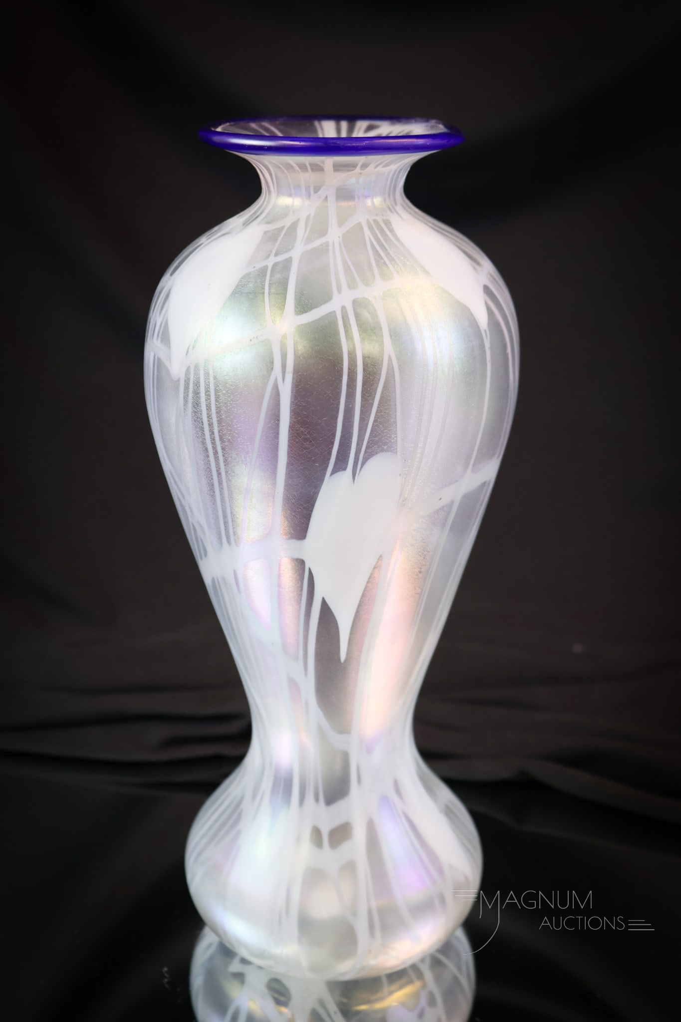 Imperial Freehand Art Glass Iridescent Heart & Vine Vase: A wonderful find in Imperial freehand art glass. This vase is in clear iridescent glass with white heart and vine decoration and a cobalt rim. The vase measures 10 1/4" tall. SHIPPING NOTICE: If you c