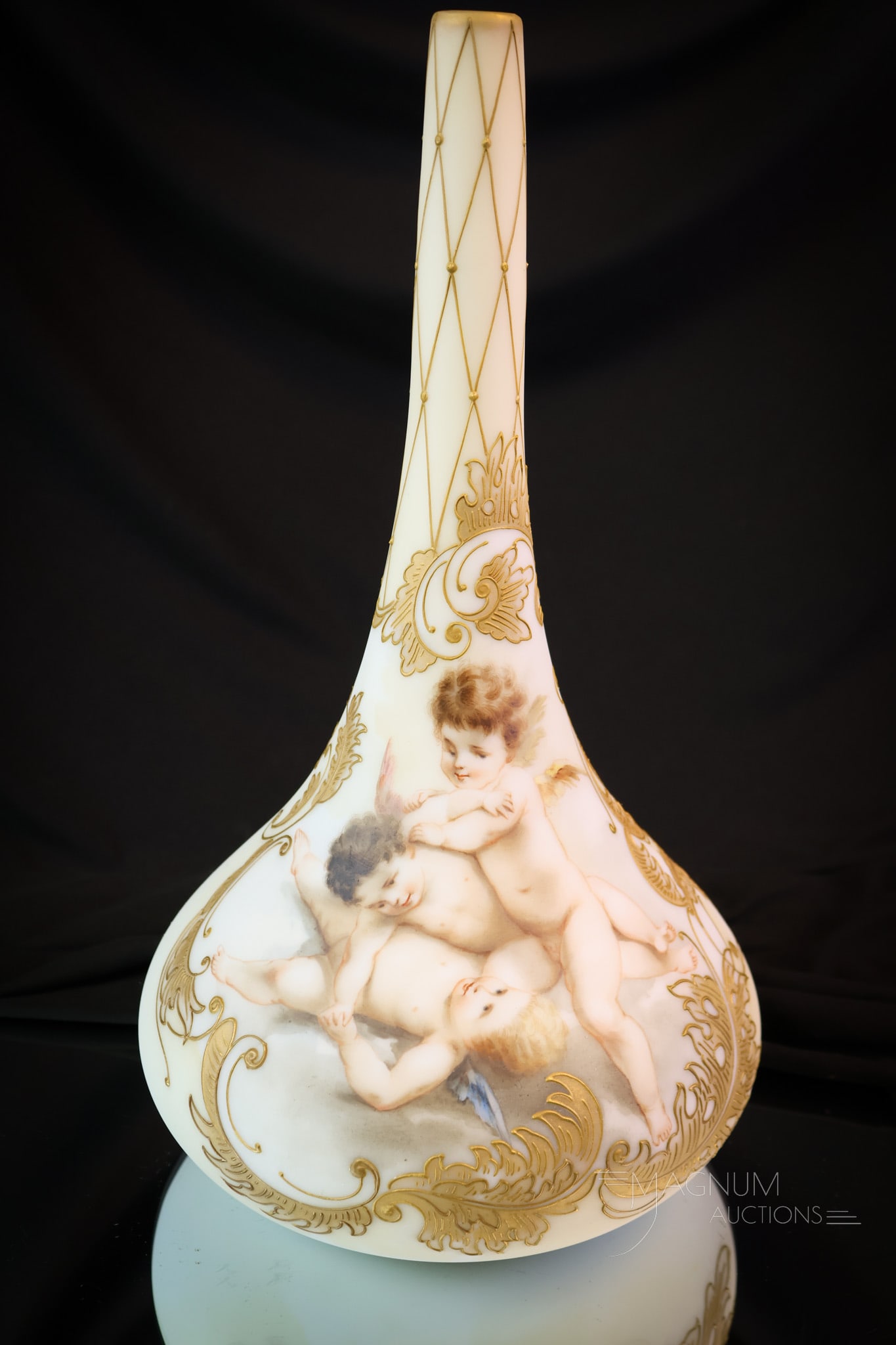 Victorian Mt. Washington Crown Milano Art Glass Cherub Vase: A wonderful find in Victorian Mt. Washington glass. This large 12 3/4" tall vase has a sleek form and is a signed example. The vase is decorated with frolicking cherubs. SHIPPING NOTICE: If you choose