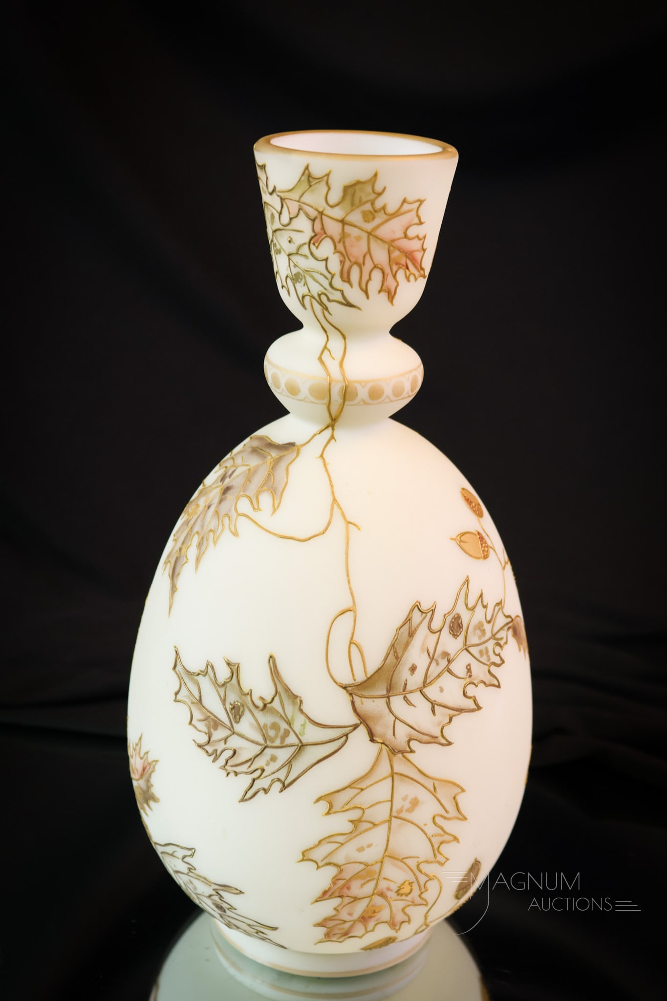 Signed Crown Milano Victorian Mt. Washington Glass Vase: A beautiful find in Mt. Washington art glass. This vase is decorated with oak leaves, acorns, and gold. The vase measures 9 1/4" tall. SHIPPING NOTICE: If you choose not to utilize the LiveAuctioneers