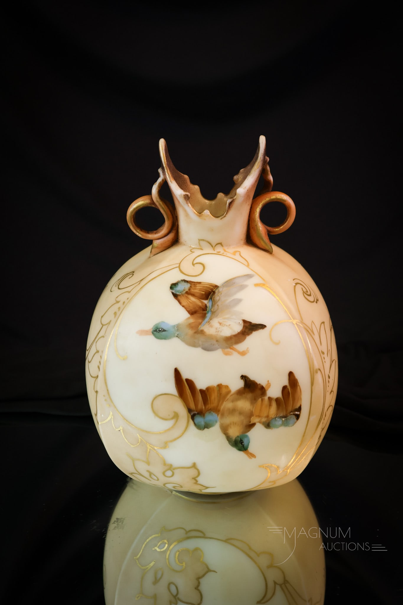 Mt. Washington Victorian Guba Duck Victorian Art Glass Vase: Another seldom seen piece of Mt. Washington Victorian art glass. This vase is decorated with Guba ducks in flight. The vase features tab handles and the top and a square form for the body. The vase me