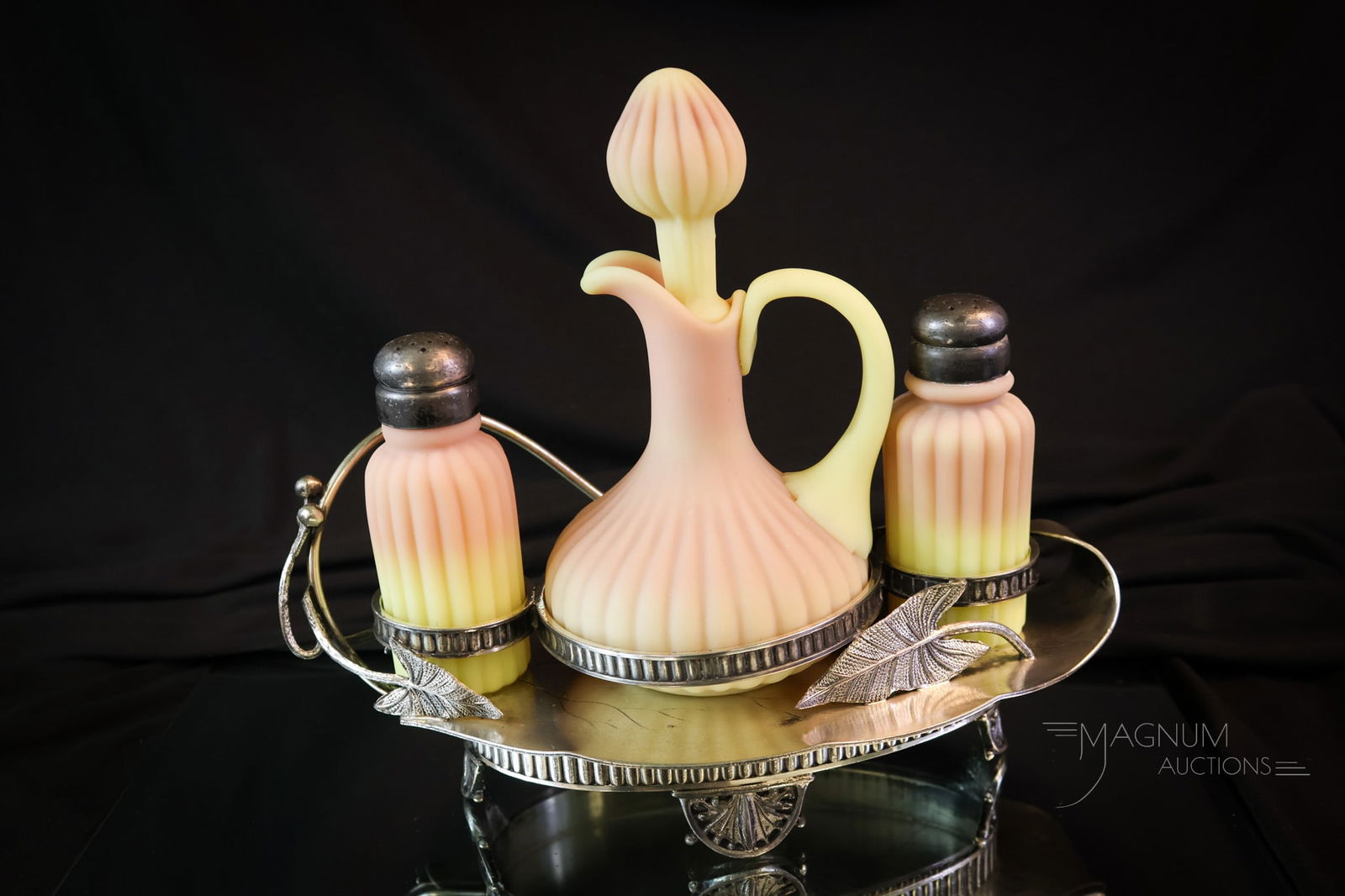 Rockford Silverplate Victorian Mt. Washington Burmese Art Glass Cruet Set: A gorgeous find in Victorian Mt. Washington glass and silverplate. This is a signed Rockford silverplate holder with foliage accents and completed with burmese glass cruet and shakers. Very nice! It m