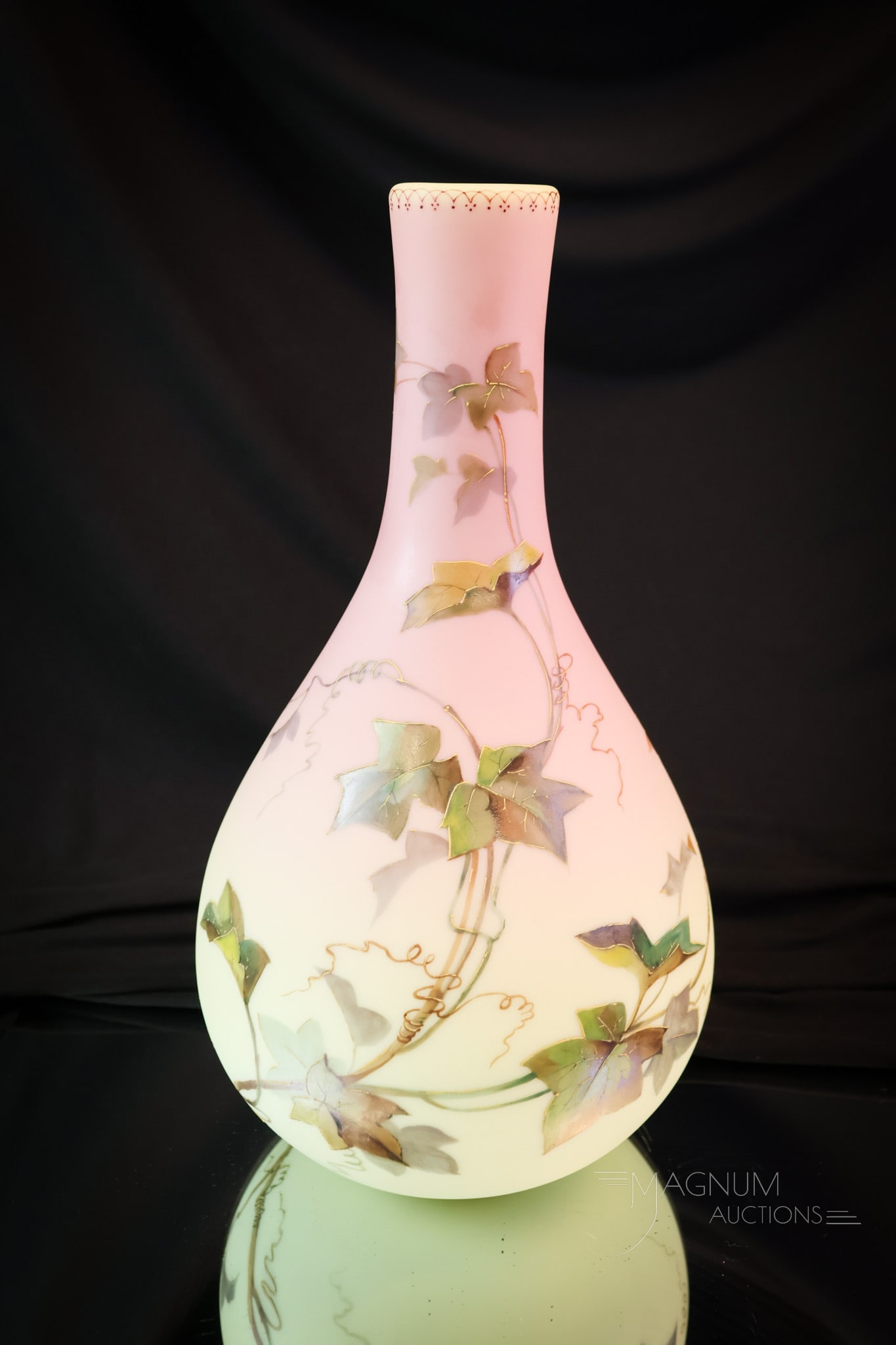 Webb Queen's Burmese Victorian Ivy Decorated Art Glass Vase: A wonderful example of Webb Queen's Burmese Victorian glass. This vase is large, measuring 11 3/4" tall and 6" wide. It is lavishly decorated with English Ivy. The piece has the Queen's Burmese mark o